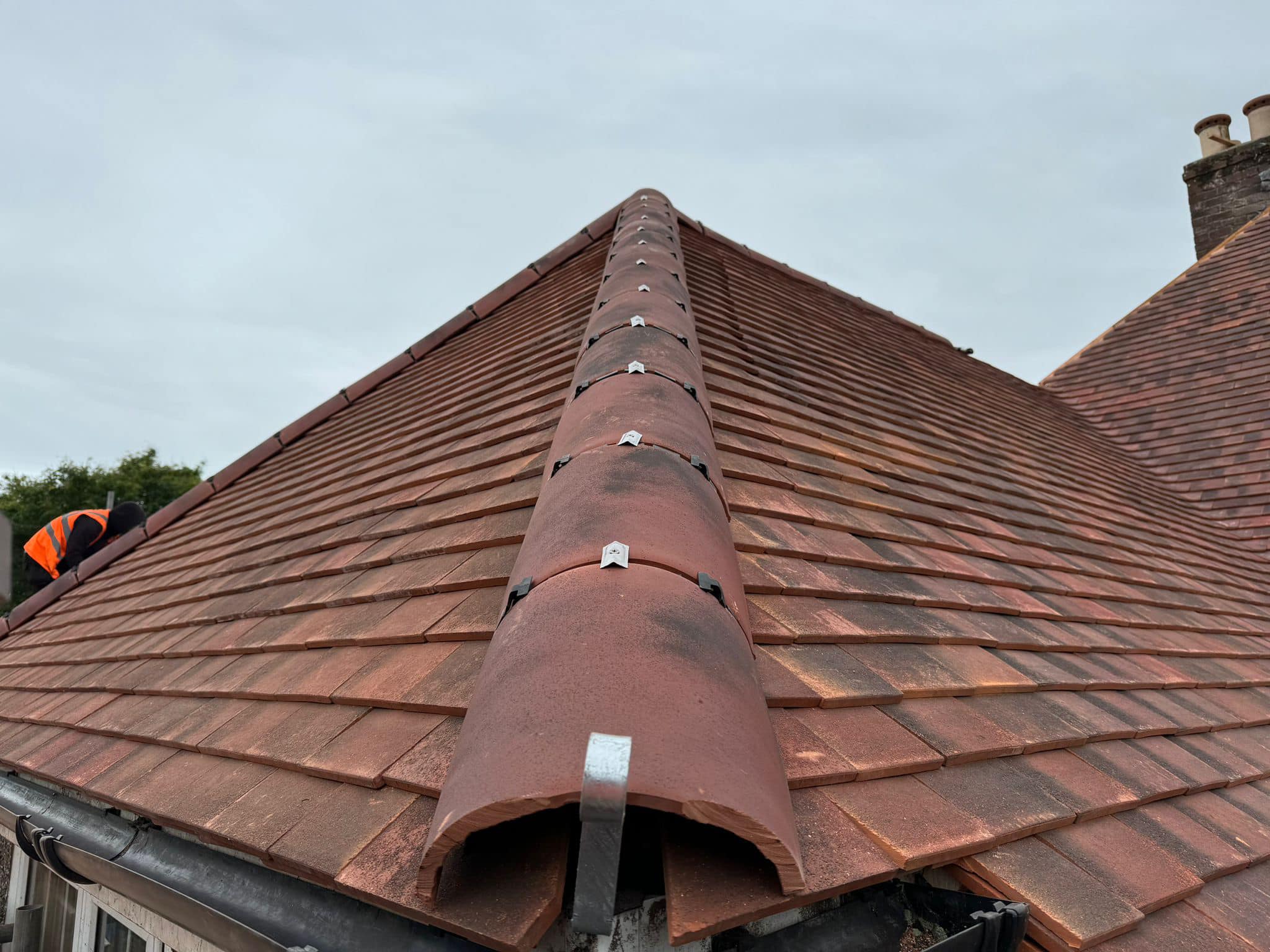 Professional roofers working on a property in London - KS Roof Master