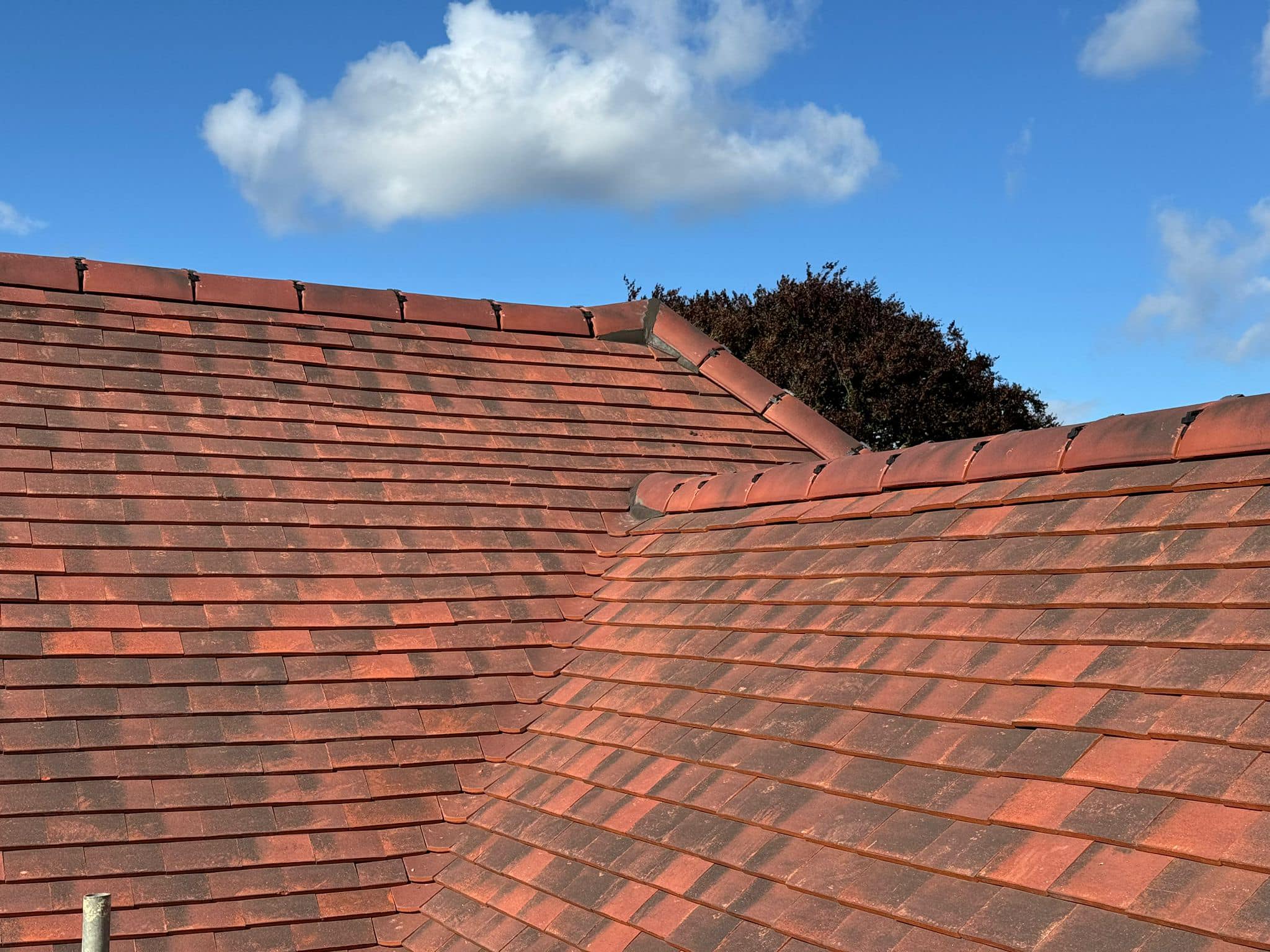 Professional roofers working on a property in London - KS Roof Master