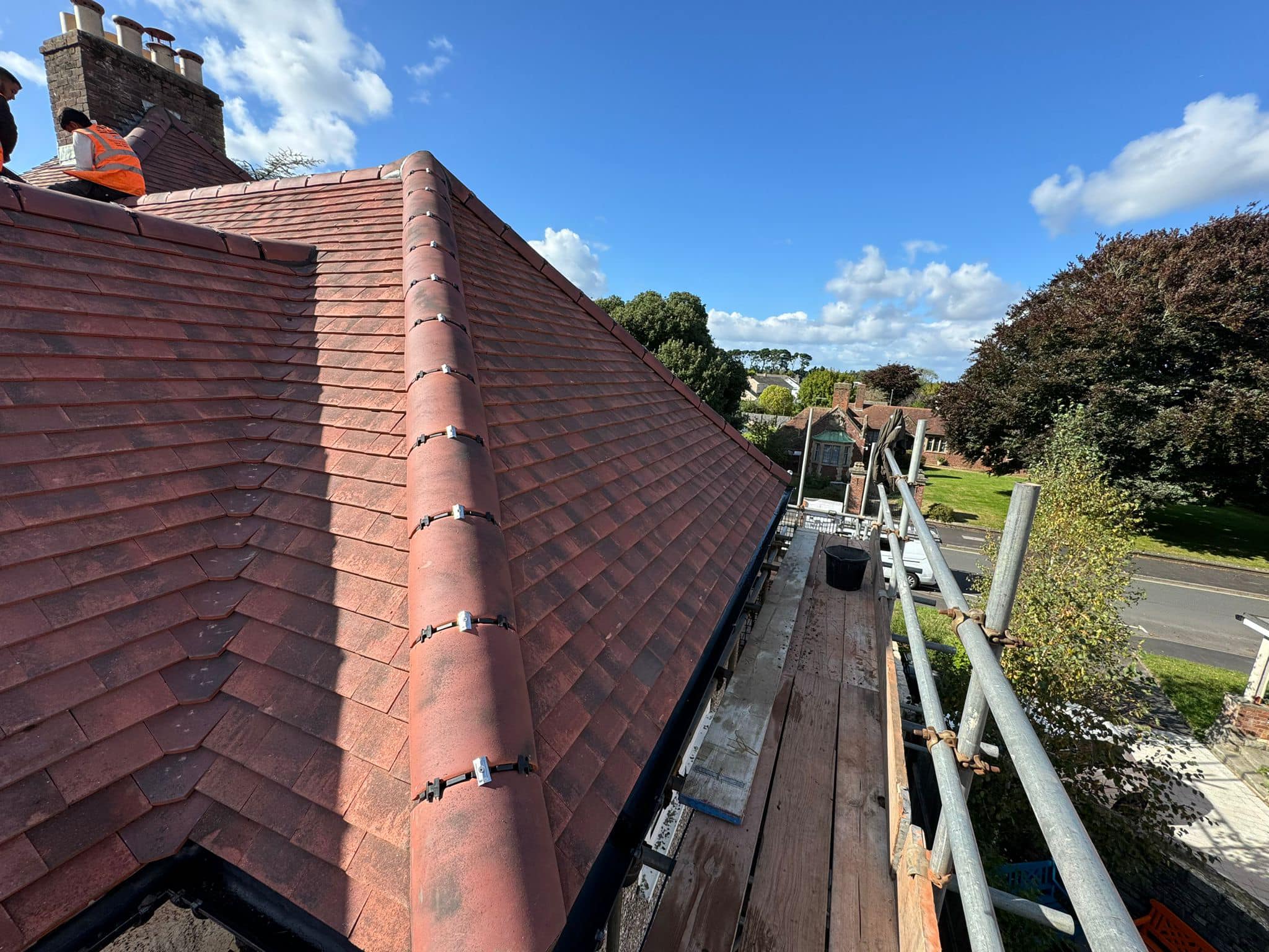 Professional roofers working on a property in London - KS Roof Master