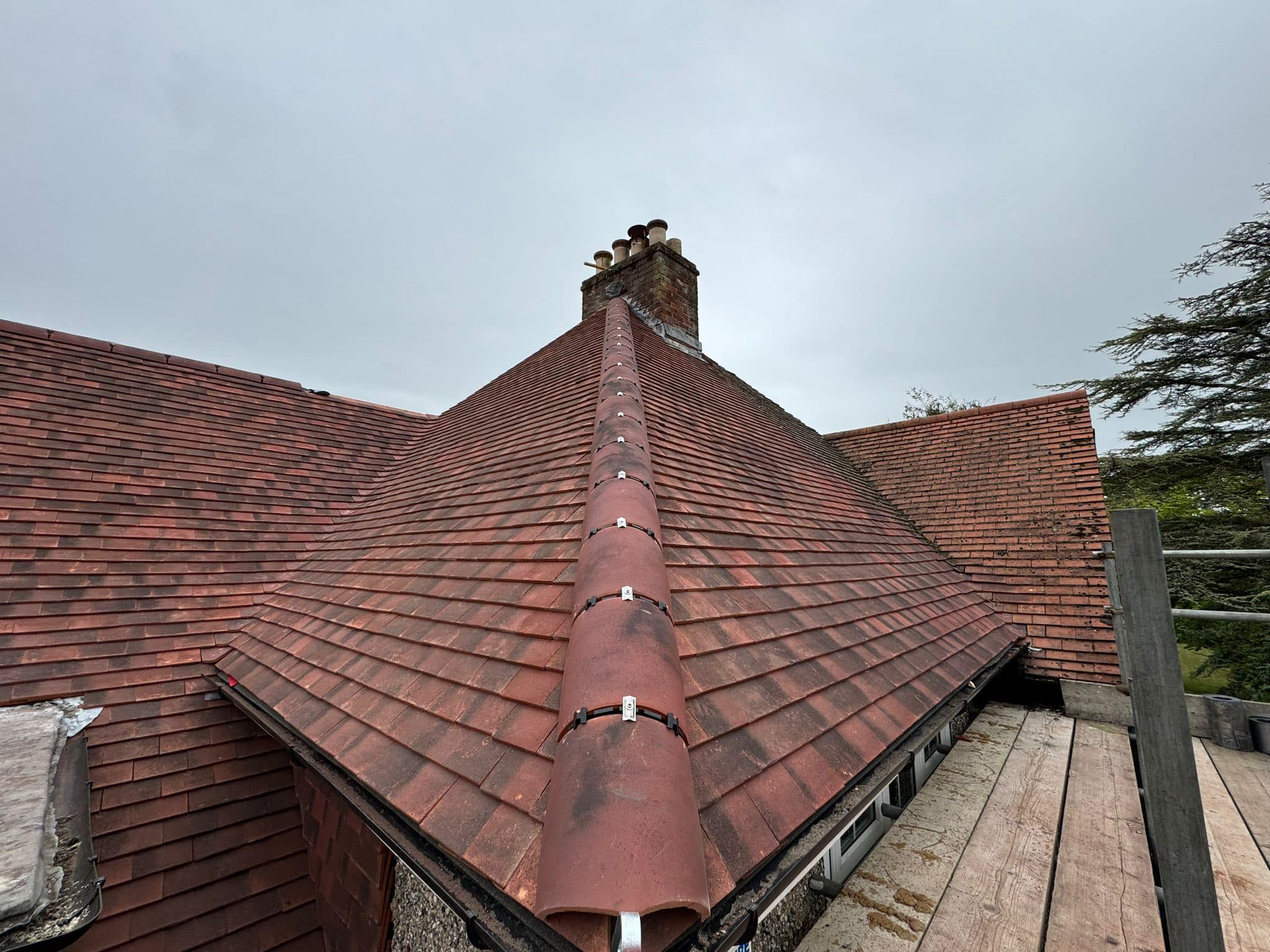 Professional roofers working on a property in London - KS Roof Master