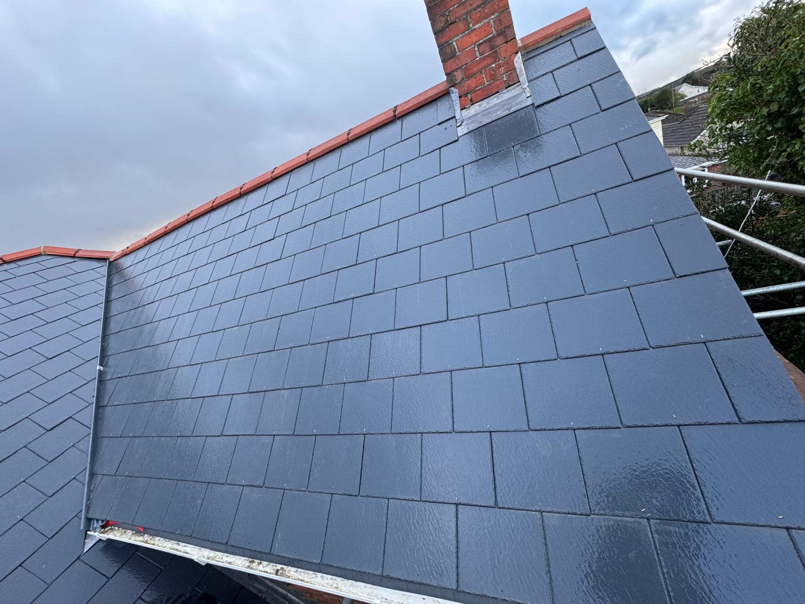 Professional roofers working on a property in London - KS Roof Master