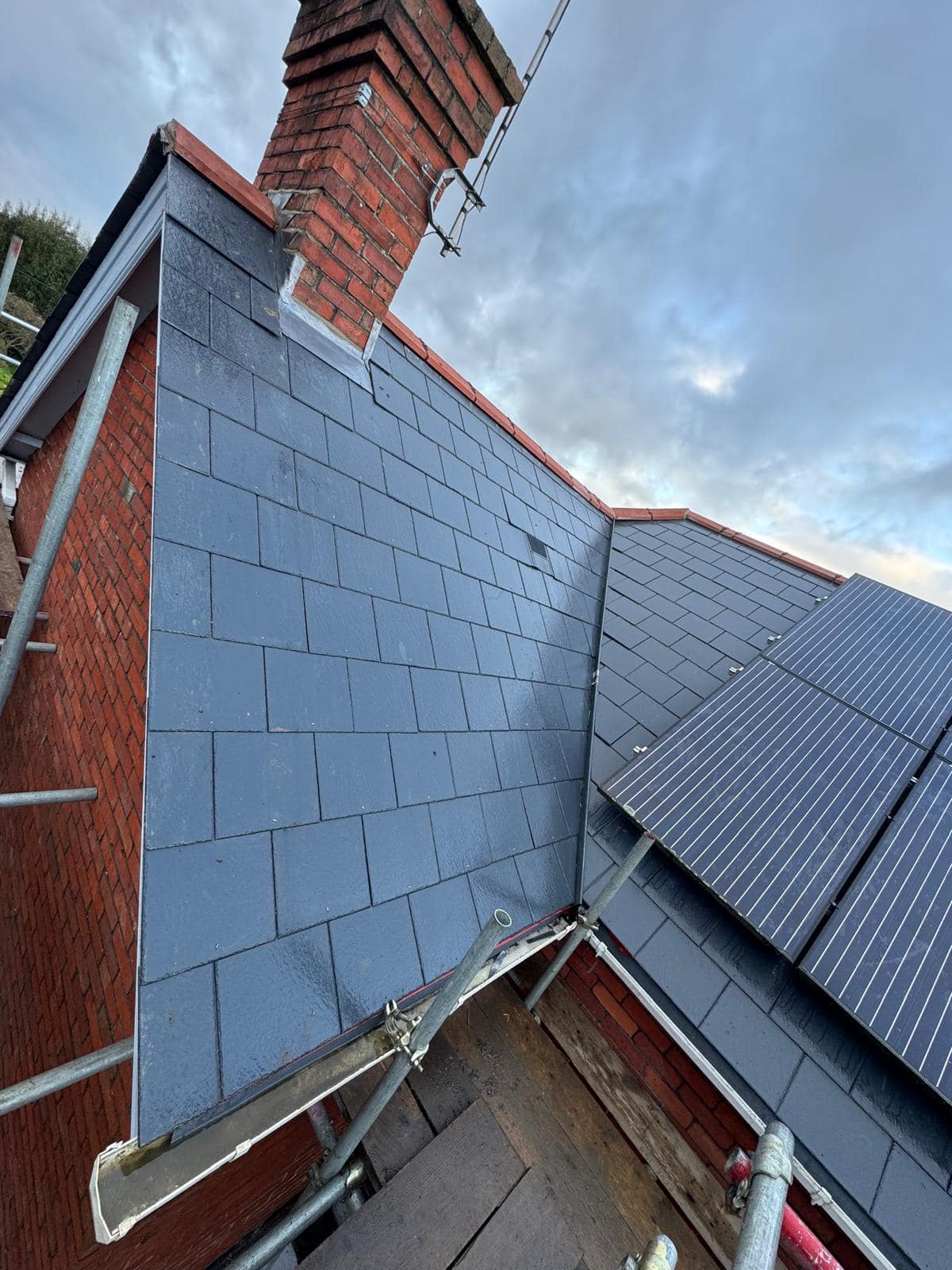Professional roofers working on a property in London - KS Roof Master