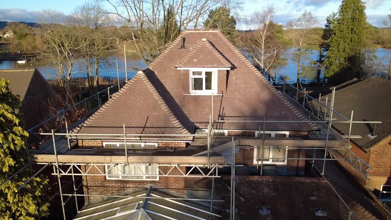 Professional roofers working on a property in London - KS Roof Master