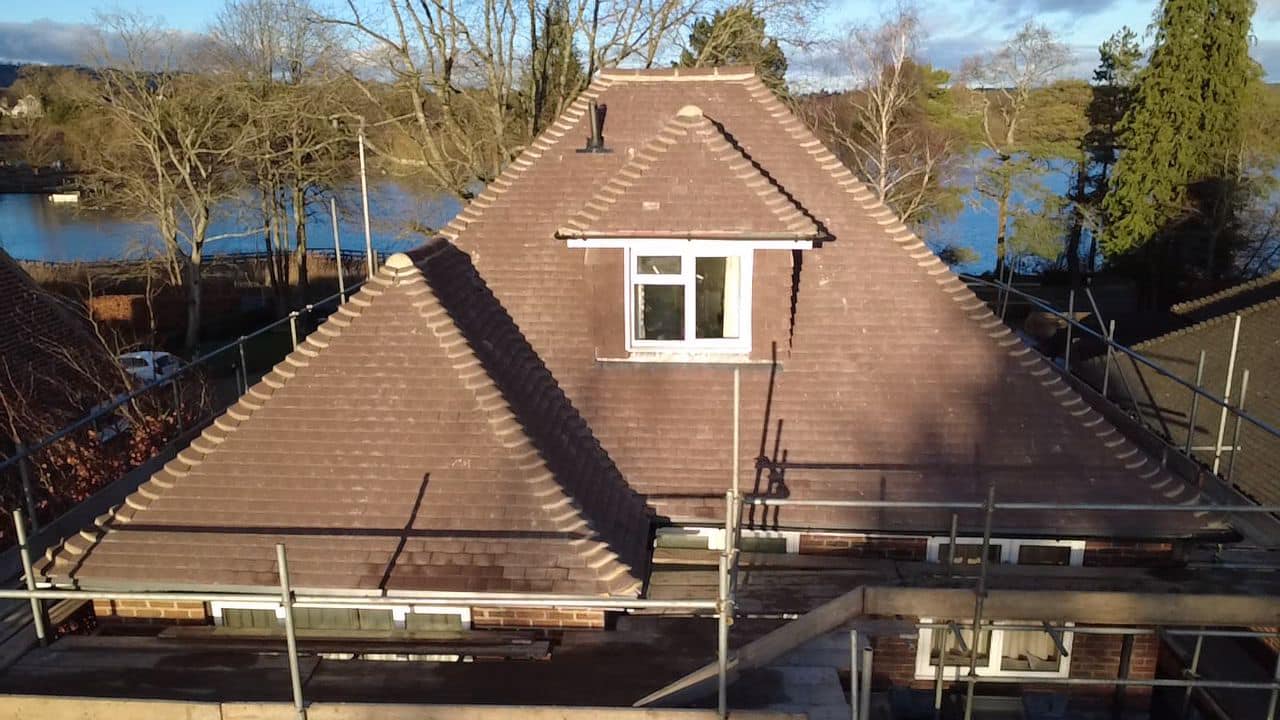 Professional roofers working on a property in London - KS Roof Master