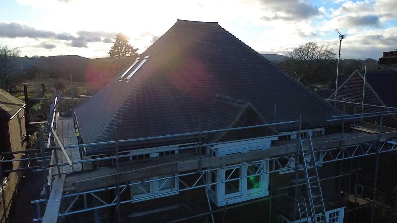 Professional roofers working on a property in London - KS Roof Master
