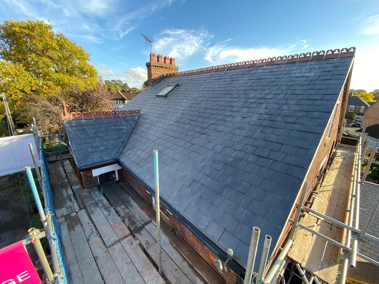 Professional roofers working on a property in London - KS Roof Master