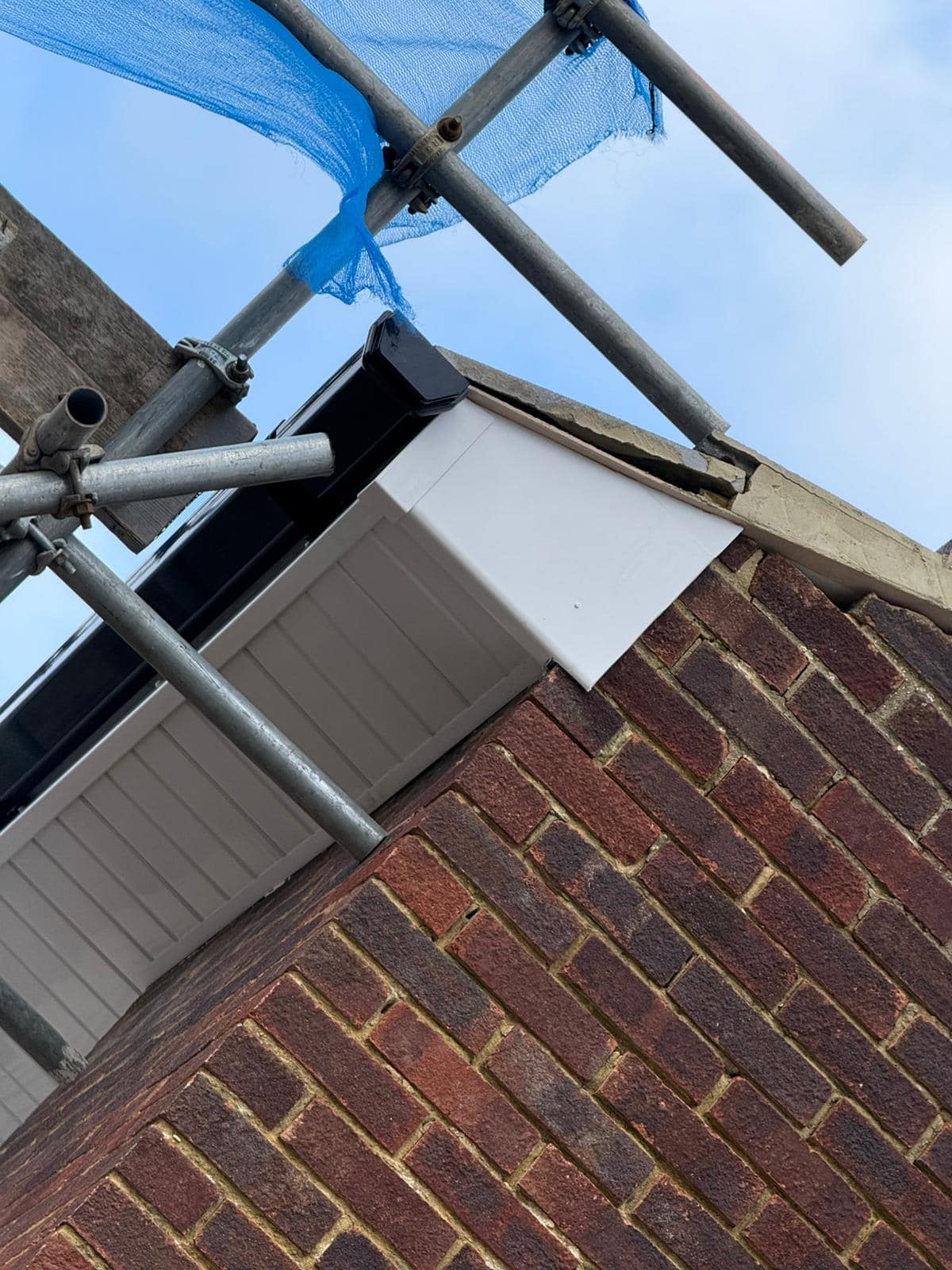 Professional roofers working on a property in London - KS Roof Master
