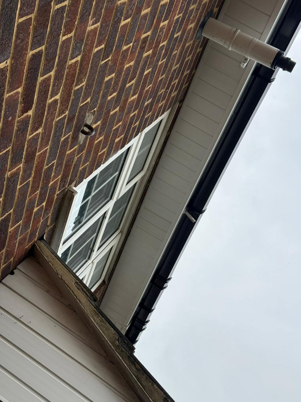 Professional roofers working on a property in London - KS Roof Master