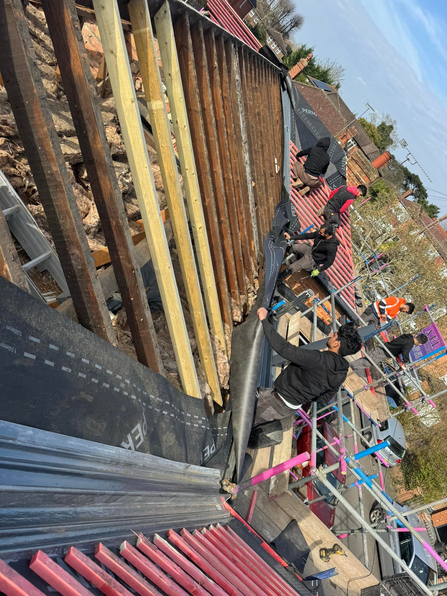 Professional roofers working on a property in London - KS Roof Master