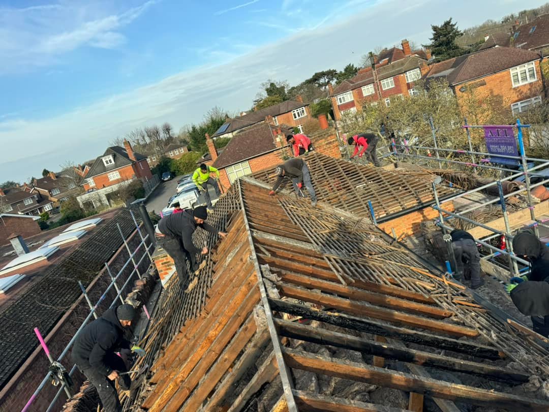 Professional roofers working on a property in London - KS Roof Master