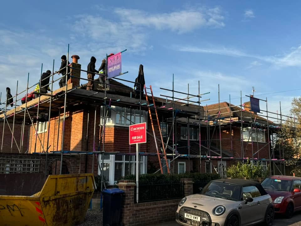Professional roofers working on a property in London - KS Roof Master