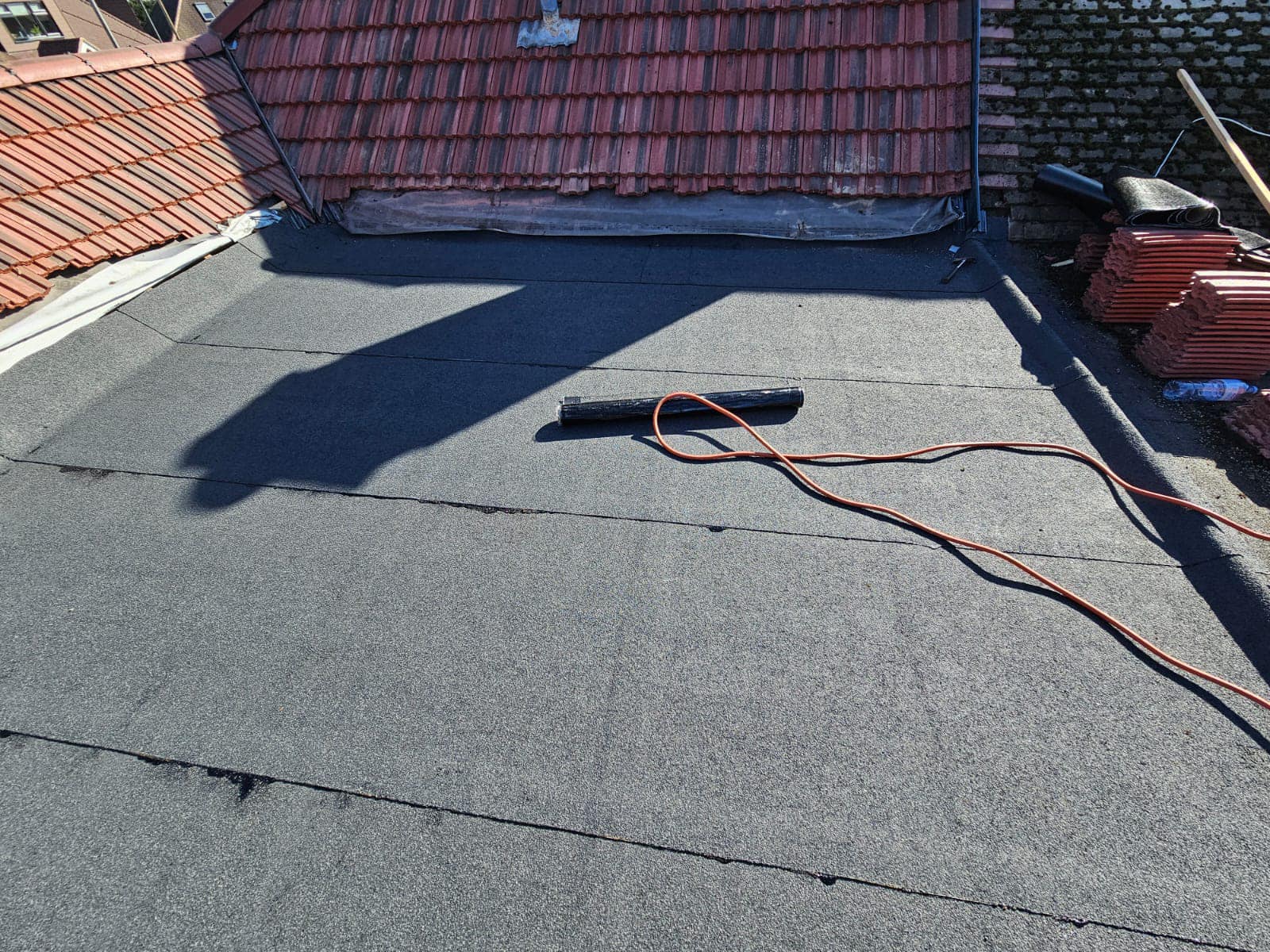 Professional roofers working on a property in London - KS Roof Master