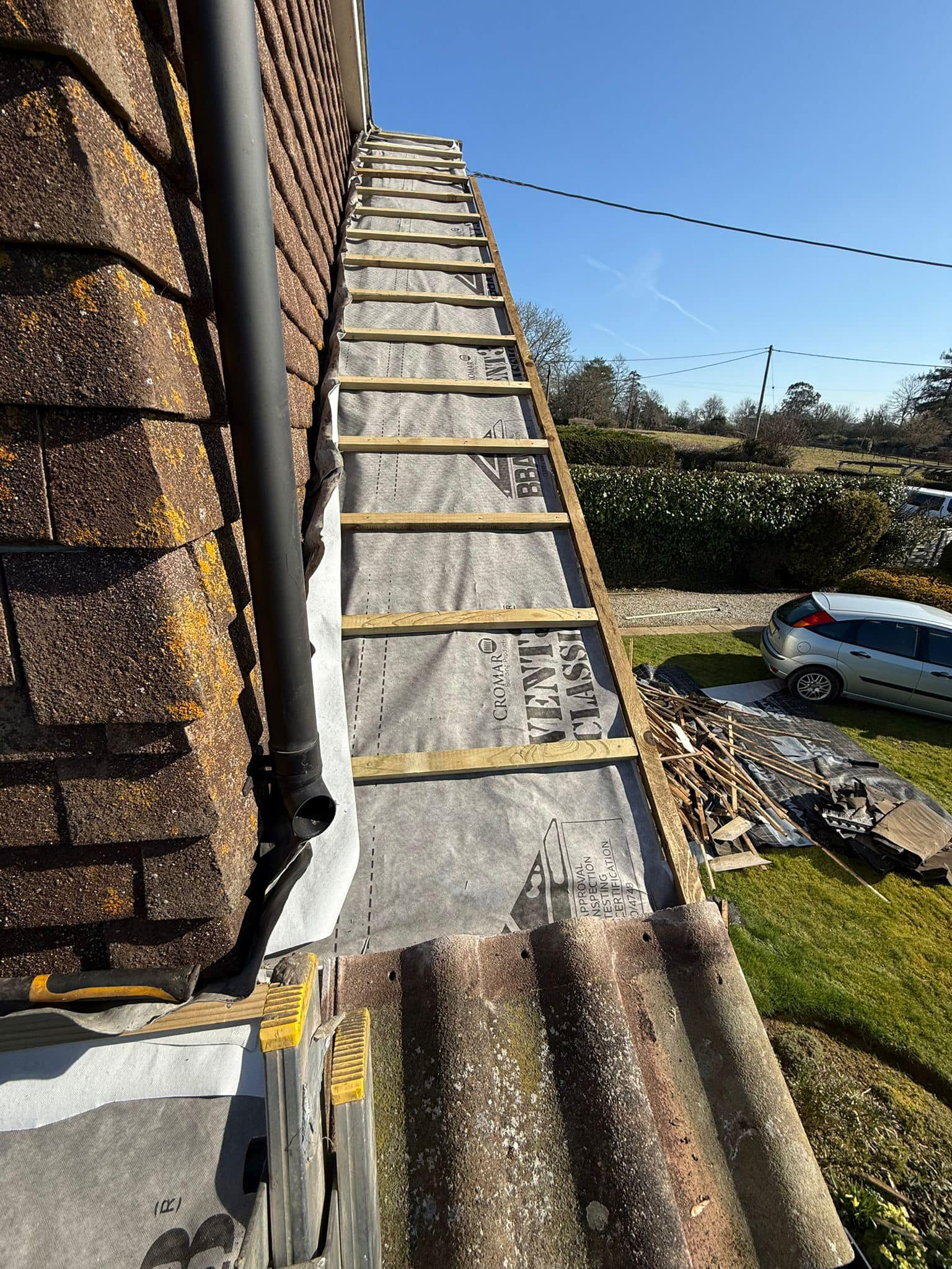 Professional roofers working on a property in London - KS Roof Master