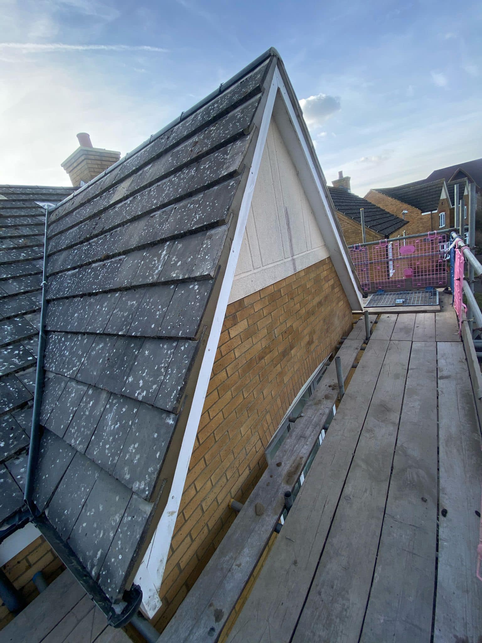 Professional roofers working on a property in London - KS Roof Master