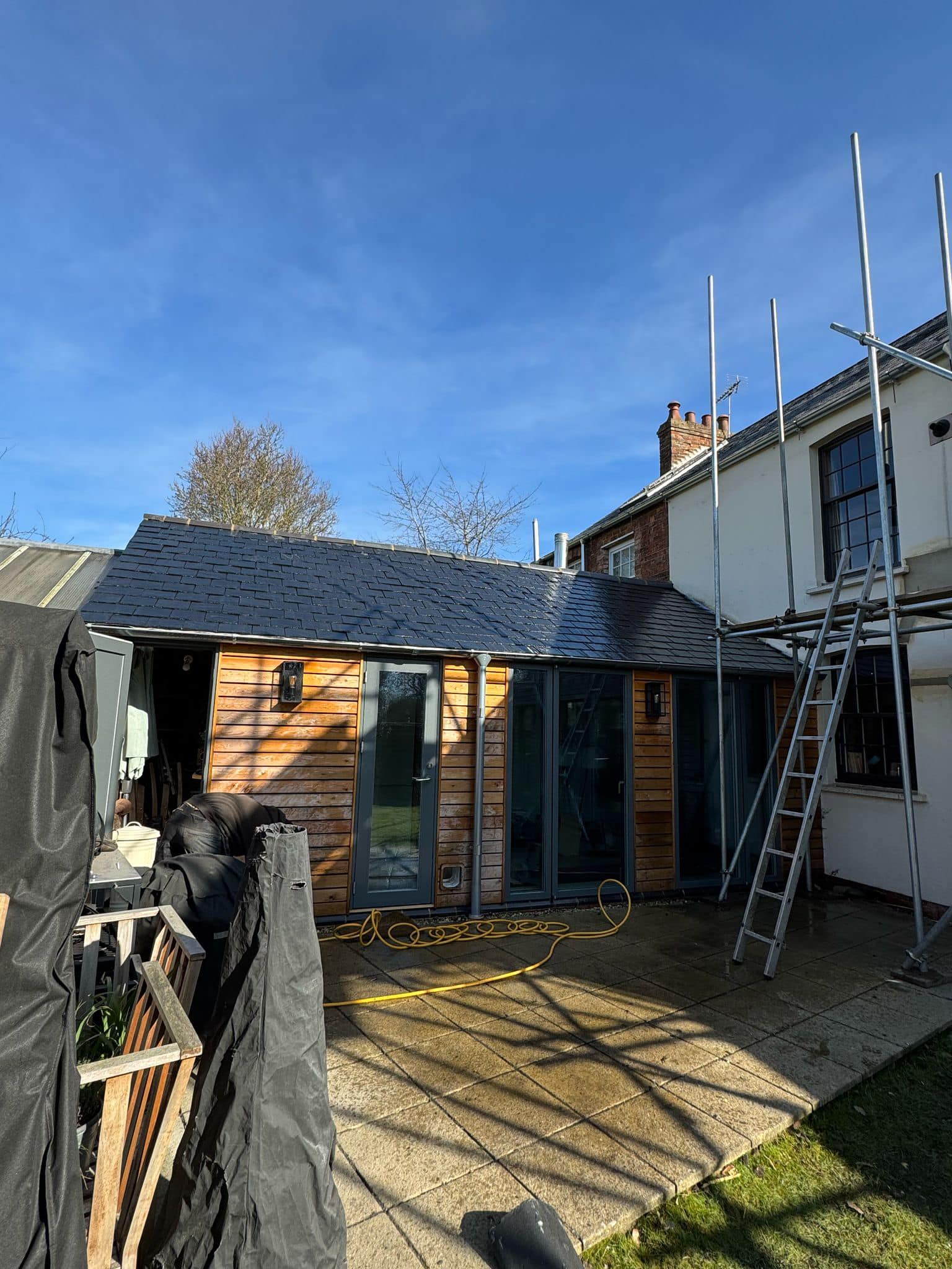 Professional roofers working on a property in London - KS Roof Master