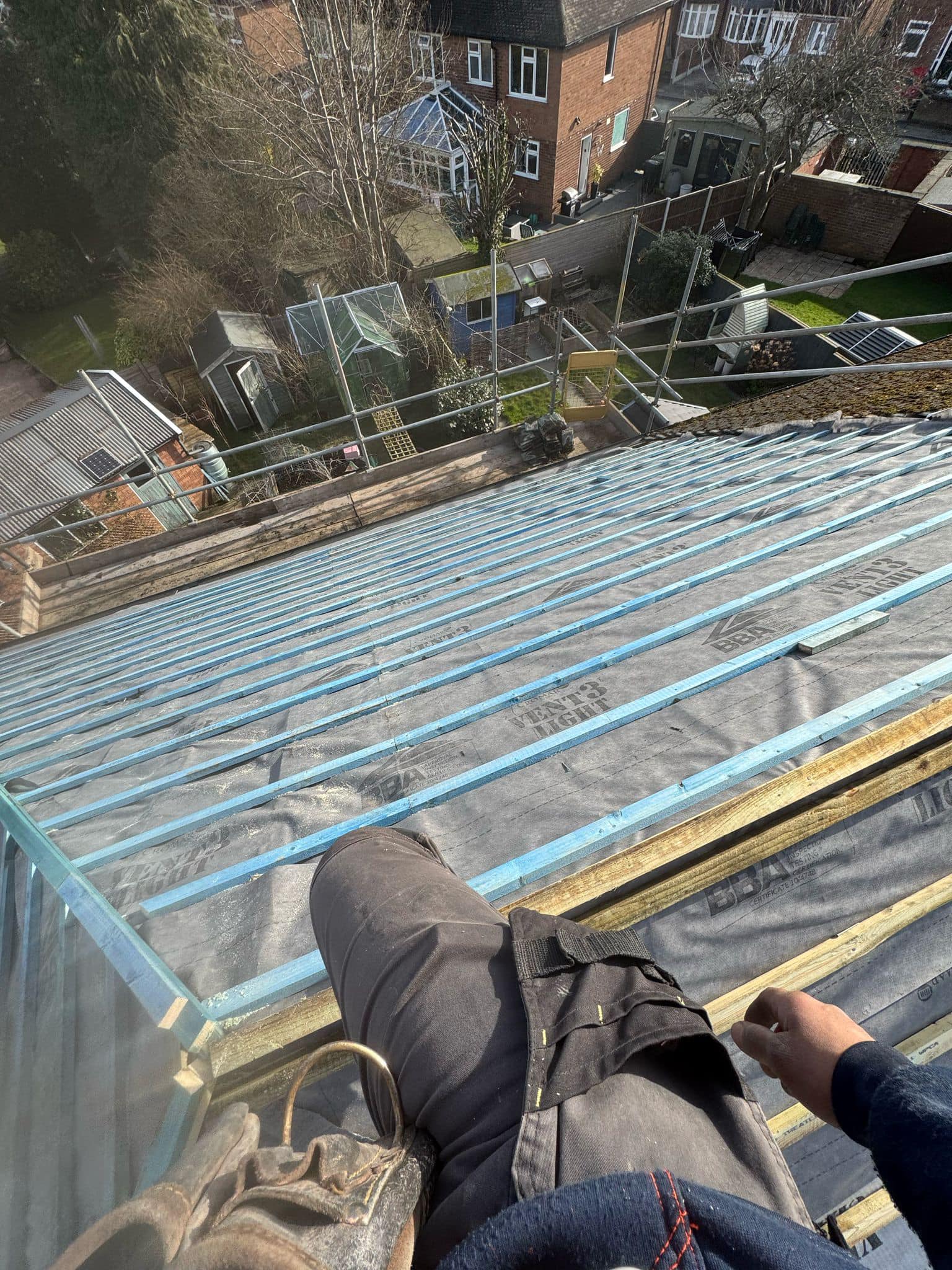 Professional roofers working on a property in London - KS Roof Master
