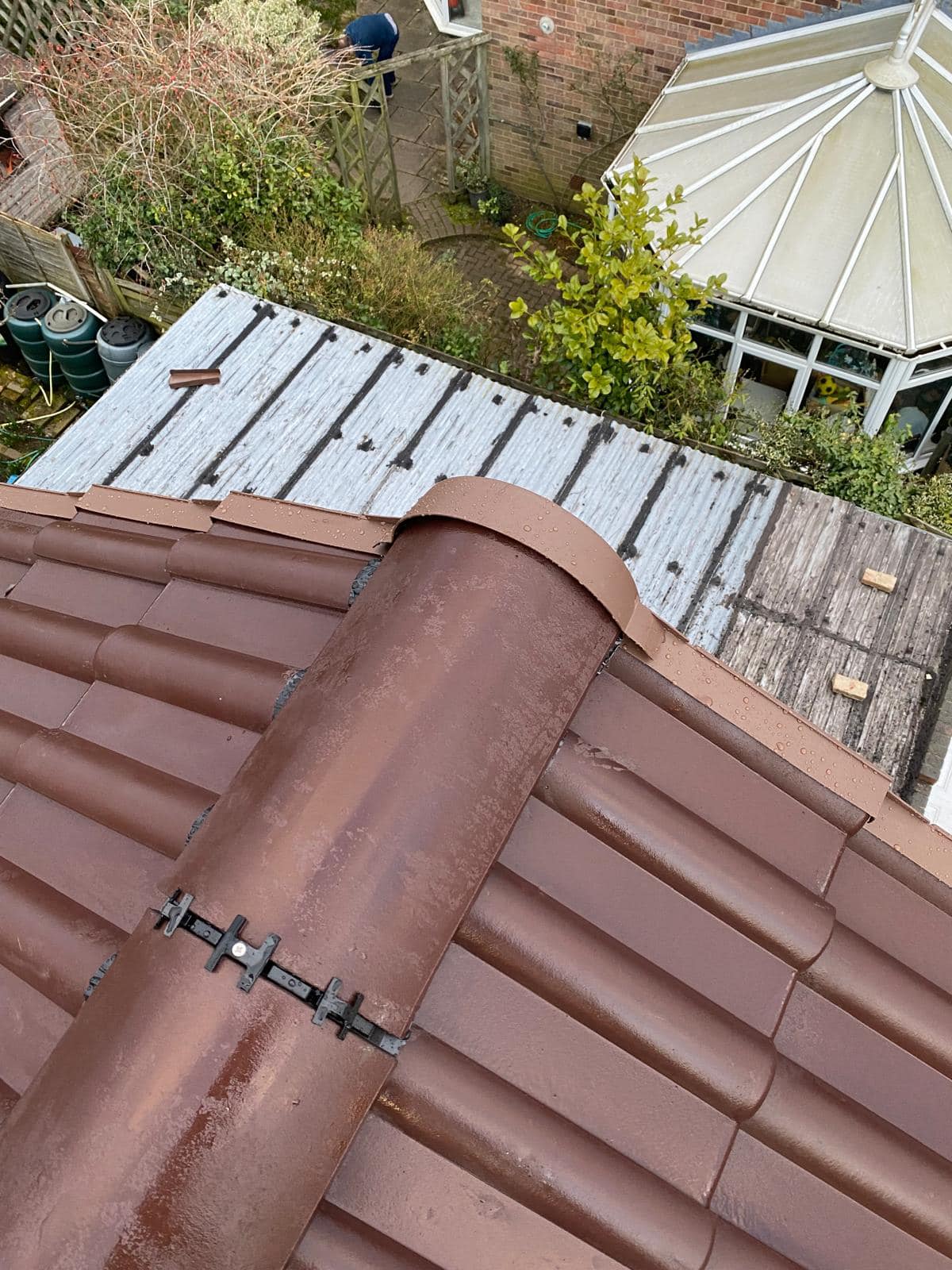 Professional roofers working on a property in London - KS Roof Master