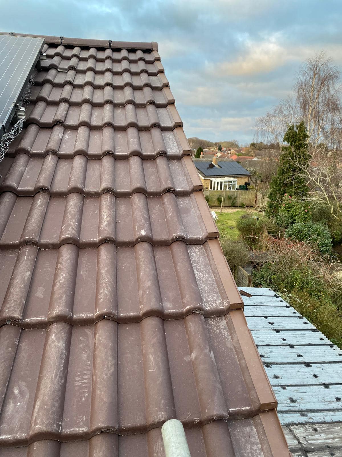Professional roofers working on a property in London - KS Roof Master