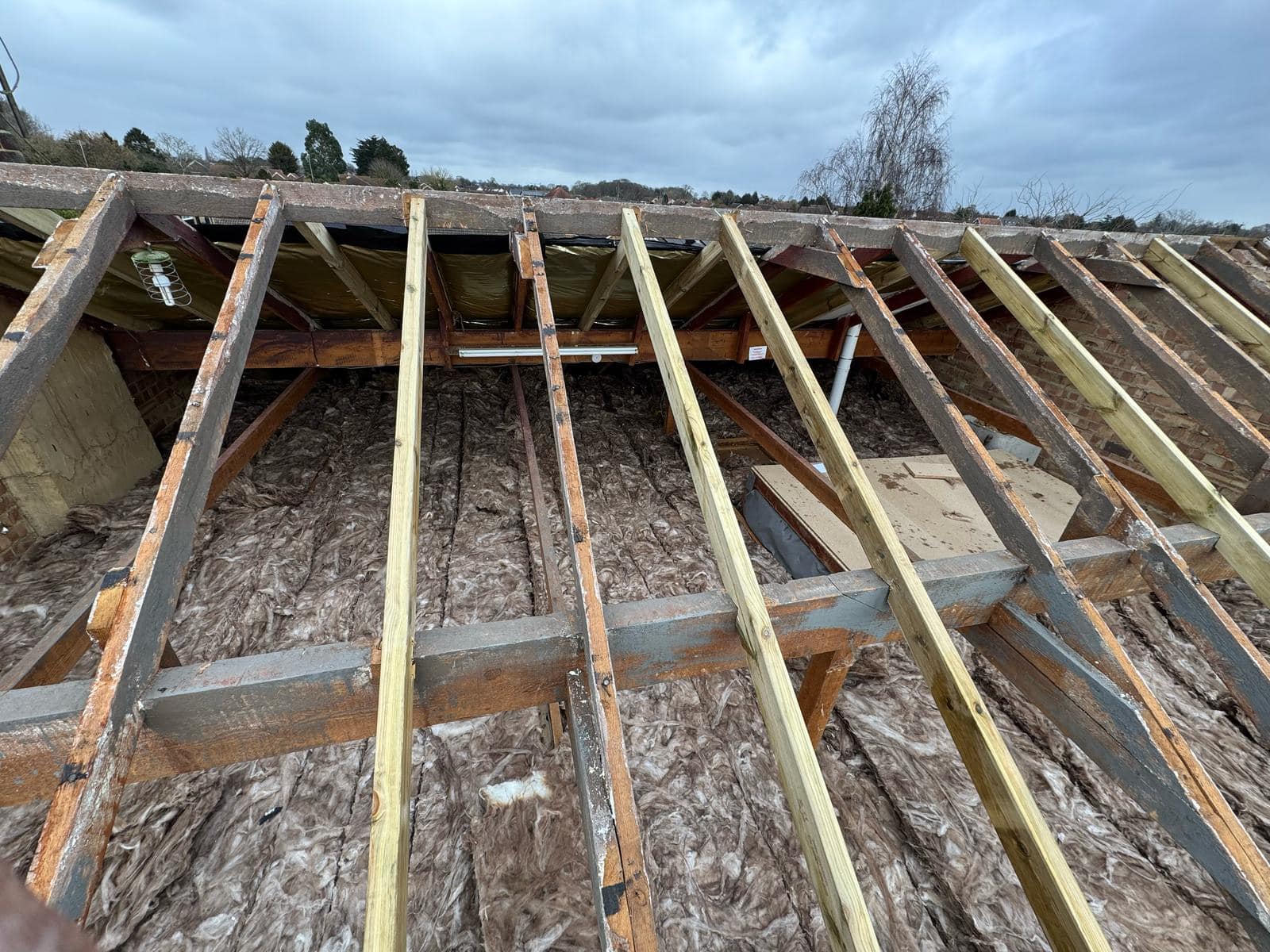 Professional roofers working on a property in London - KS Roof Master