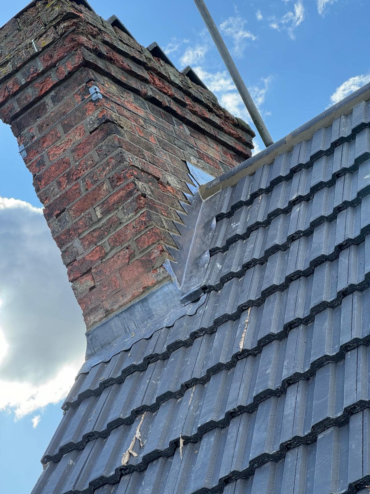 Professional roofers working on a property in London - KS Roof Master