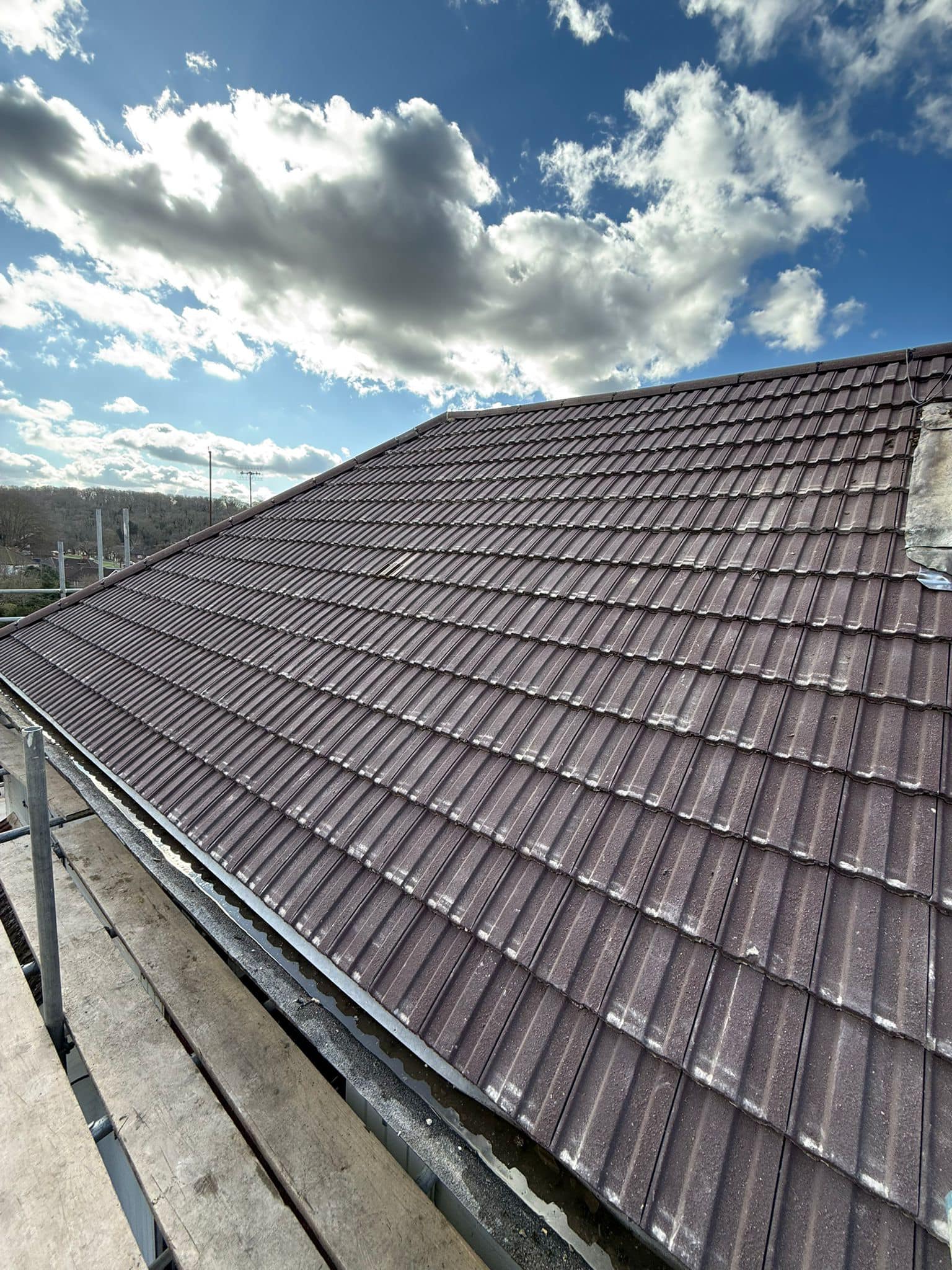 Professional roofers working on a property in London - KS Roof Master