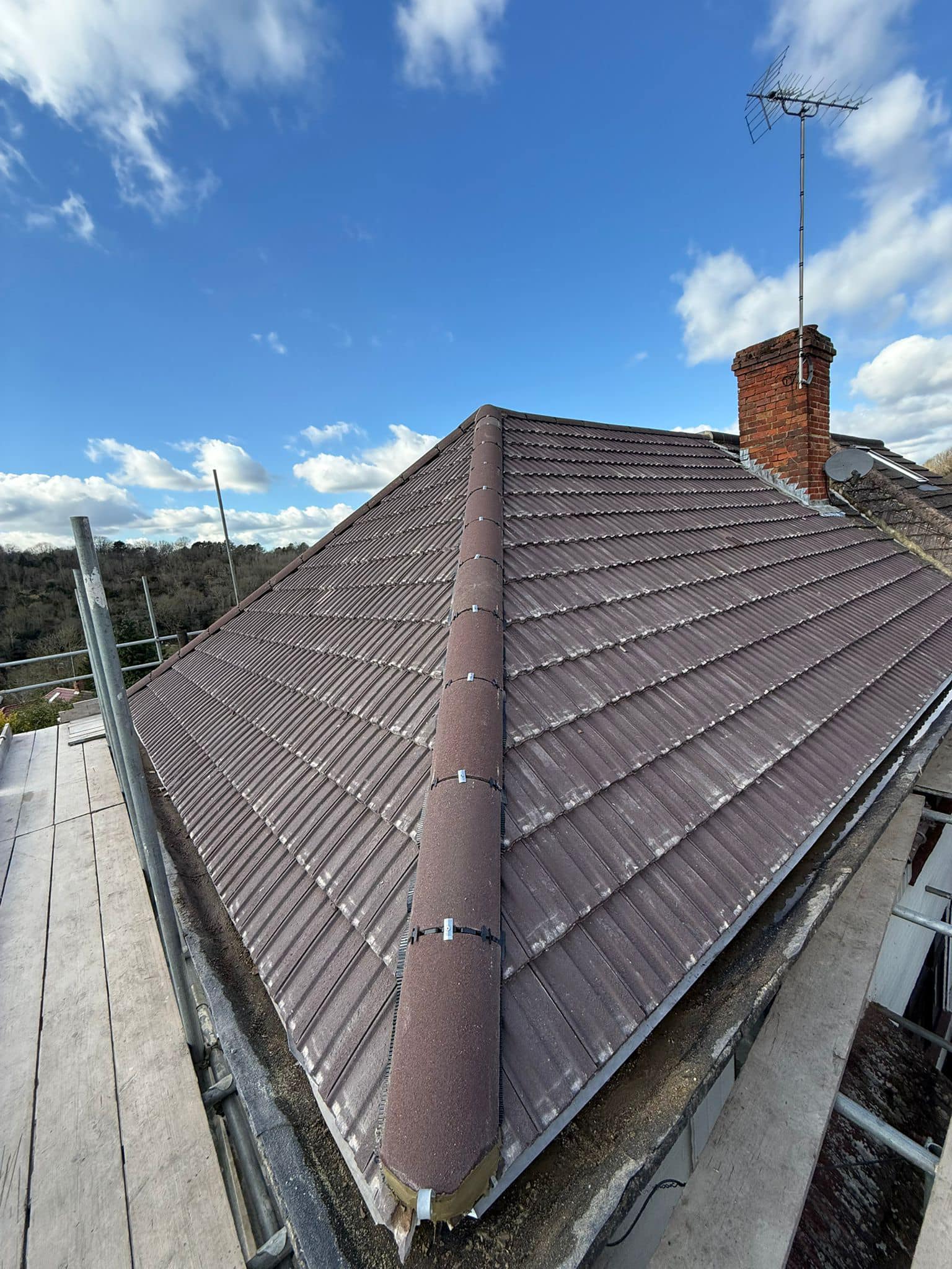 Professional roofers working on a property in London - KS Roof Master