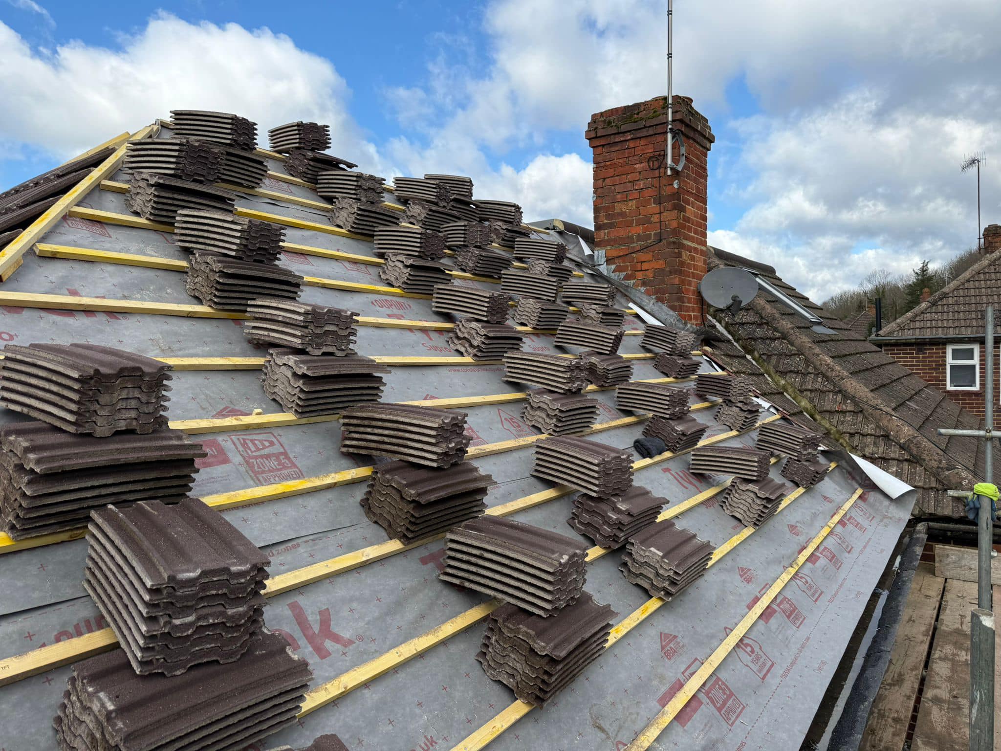 Professional roofers working on a property in London - KS Roof Master