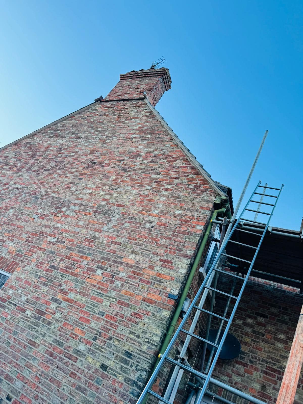 Professional roofers working on a property in London - KS Roof Master