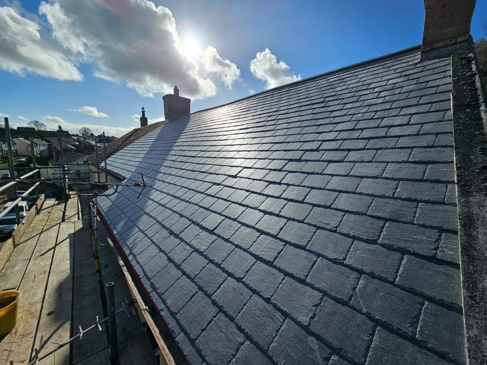 Professional roofers working on a property in London - KS Roof Master
