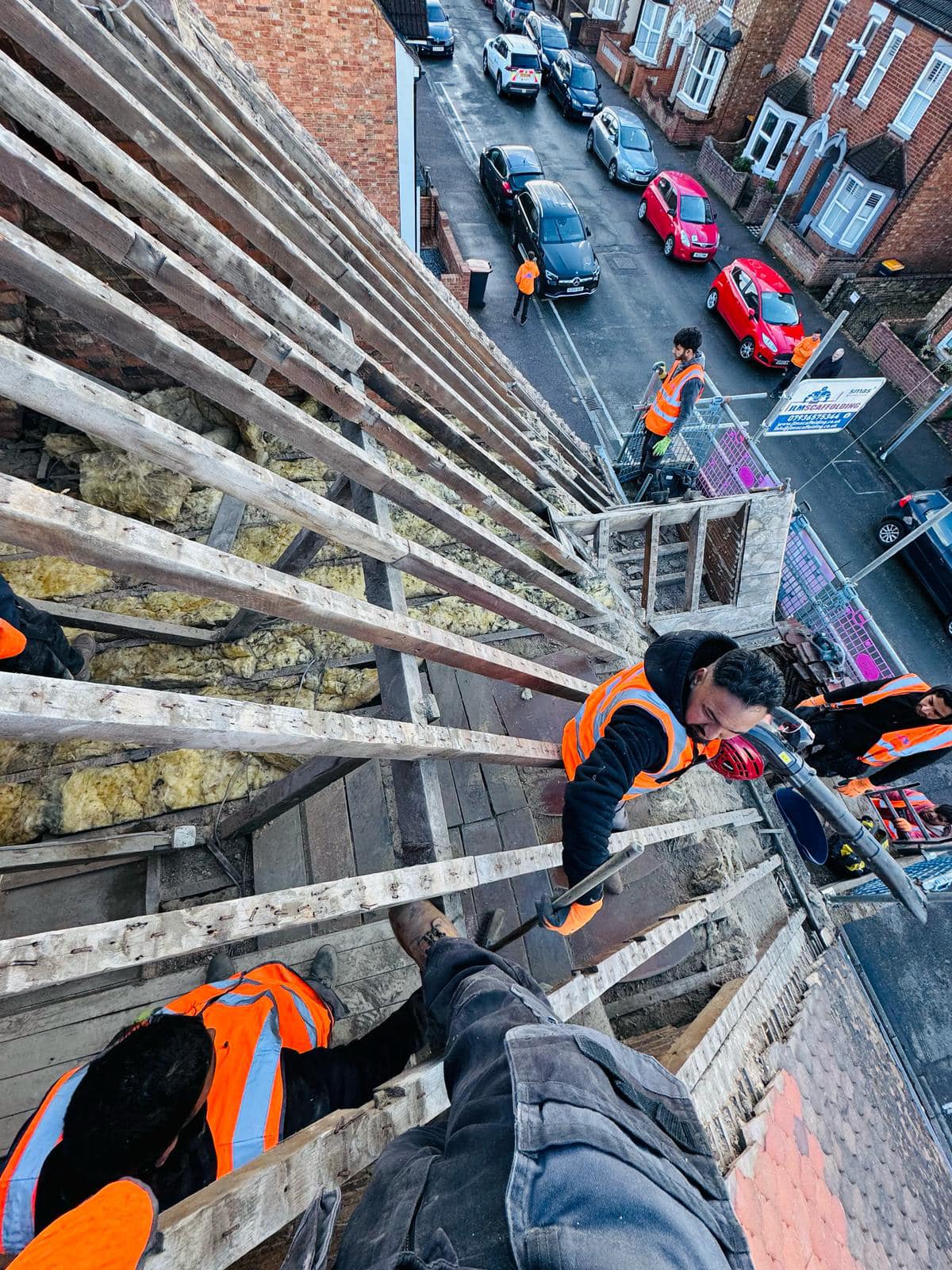 Professional roofers working on a property in London - KS Roof Master