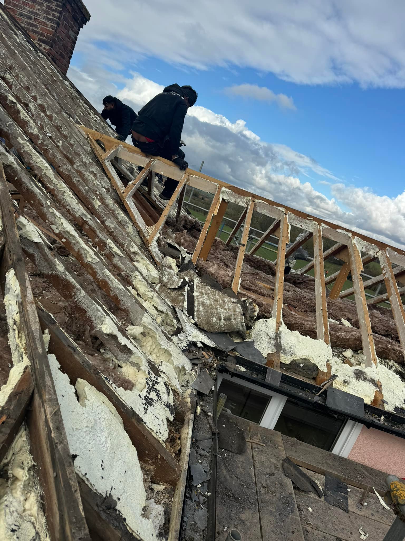 Professional roofers working on a property in London - KS Roof Master