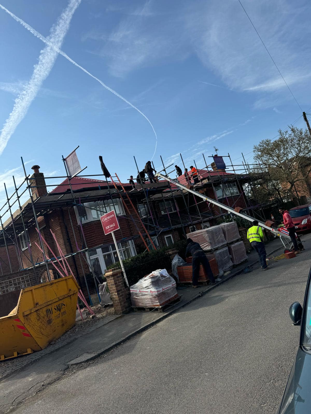 Professional roofers working on a property in London - KS Roof Master