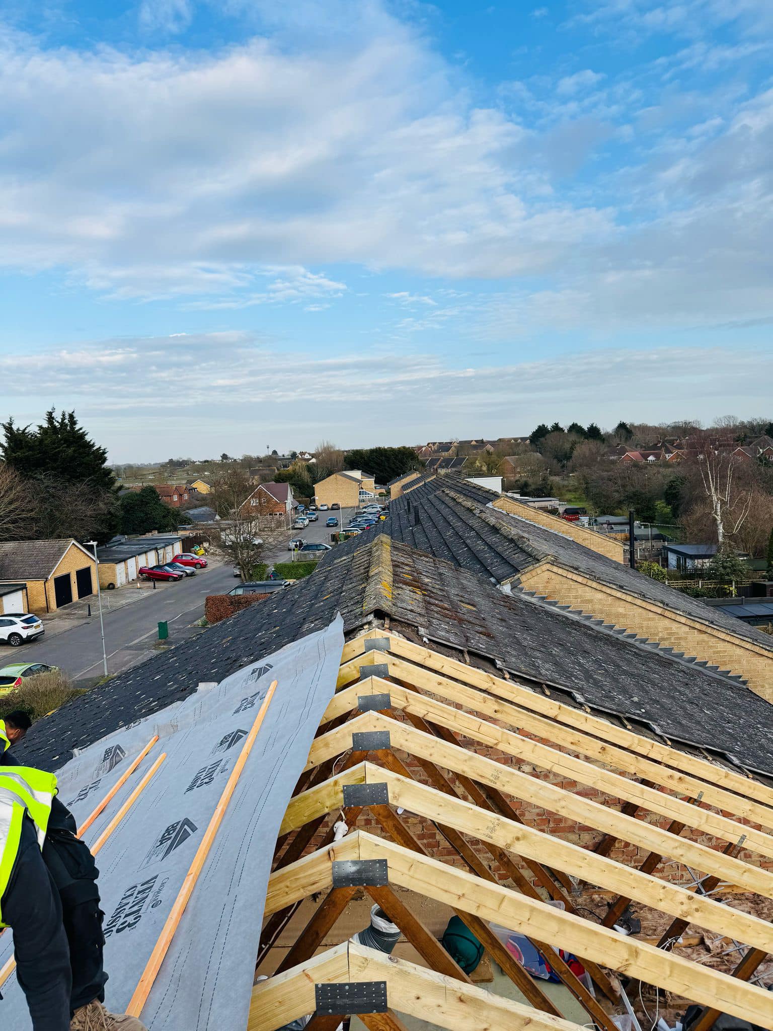 Professional roofers working on a property in London - KS Roof Master