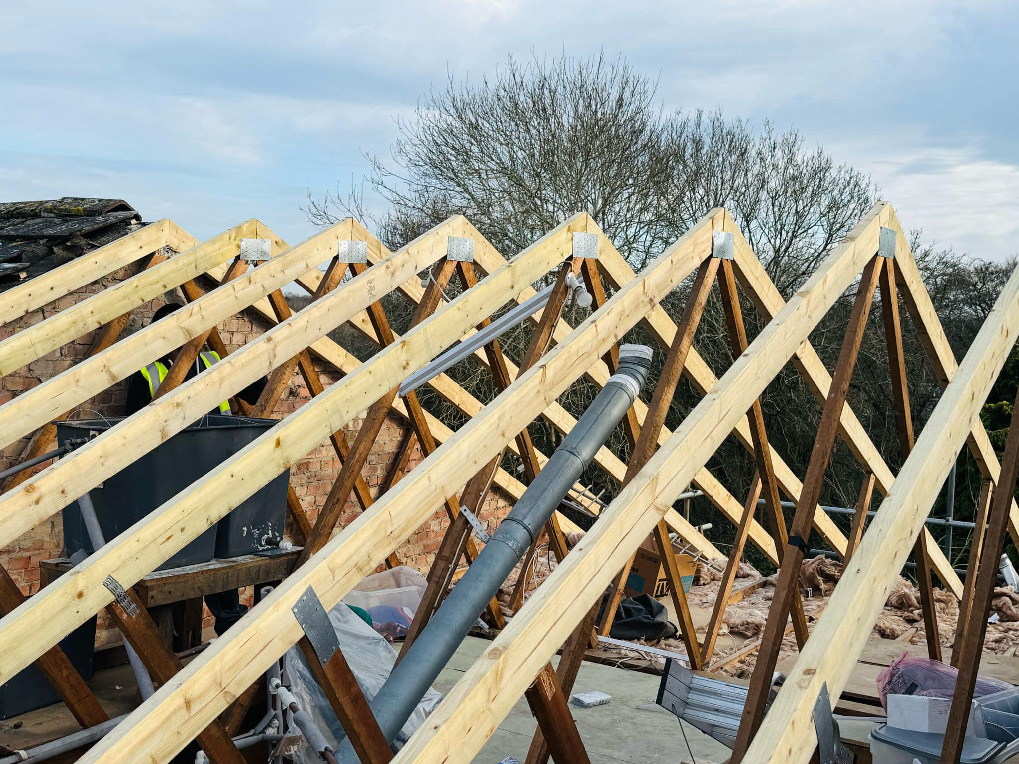 Professional roofers working on a property in London - KS Roof Master