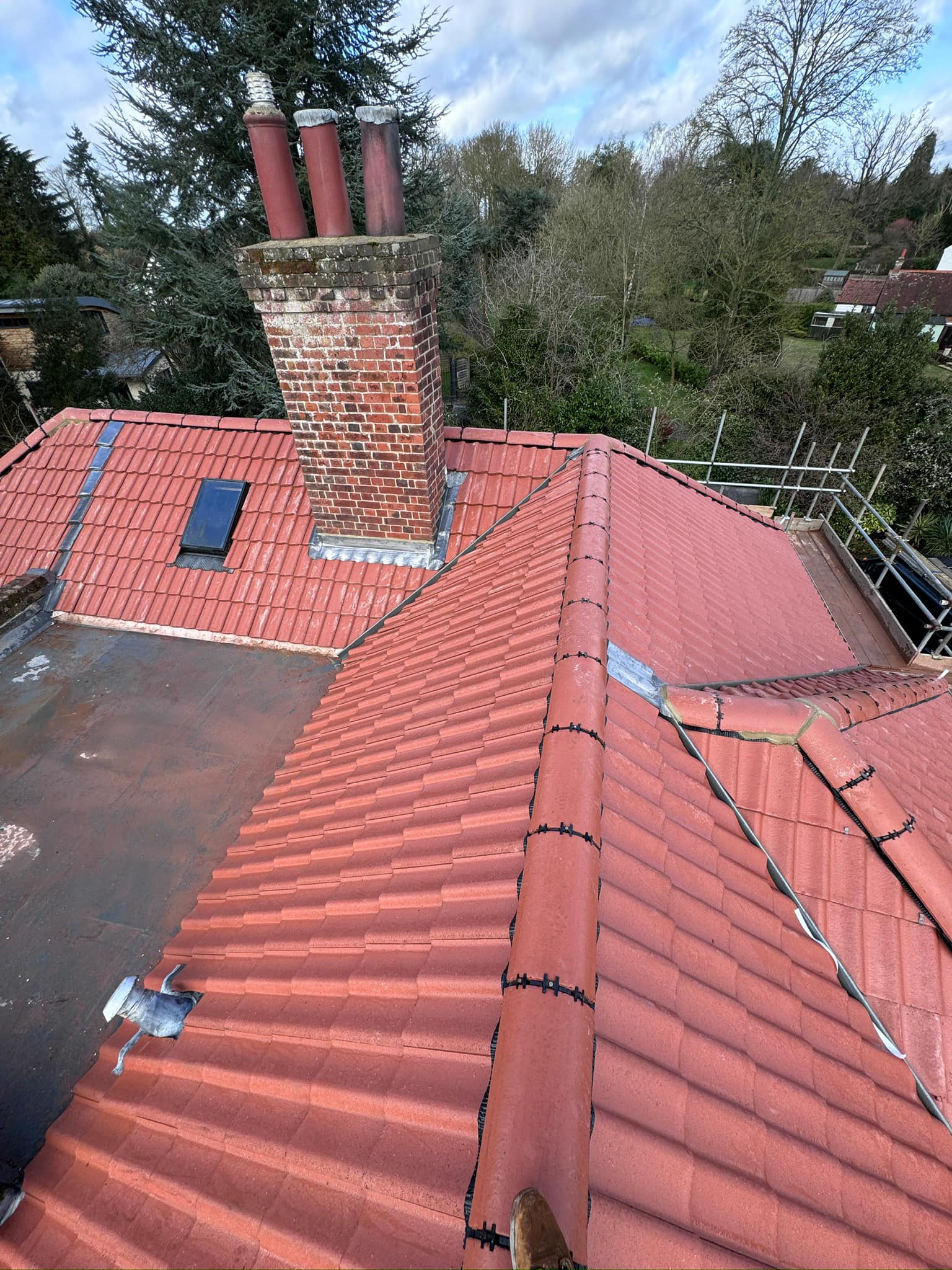 Professional roofers working on a property in London - KS Roof Master
