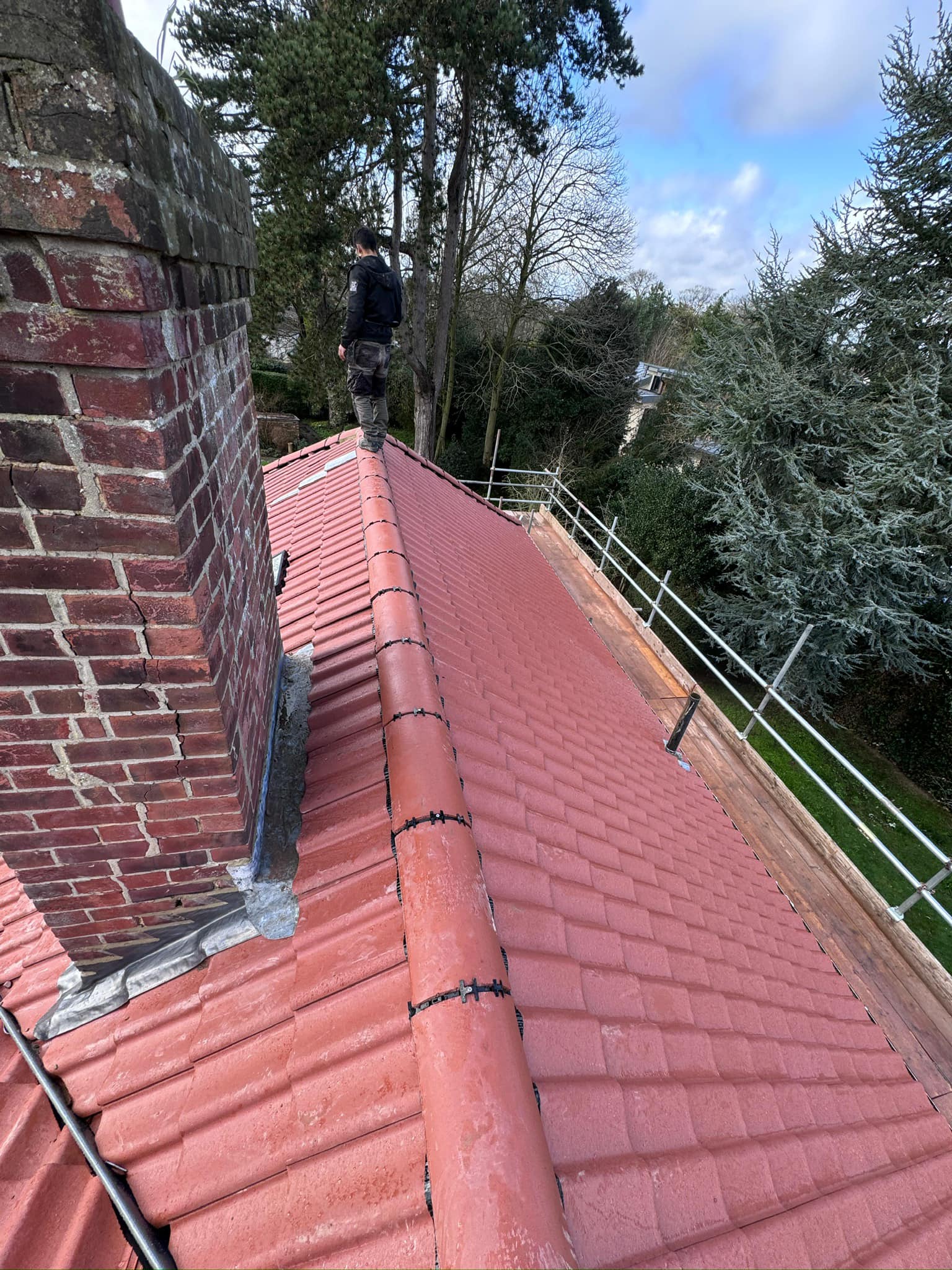 Professional roofers working on a property in London - KS Roof Master