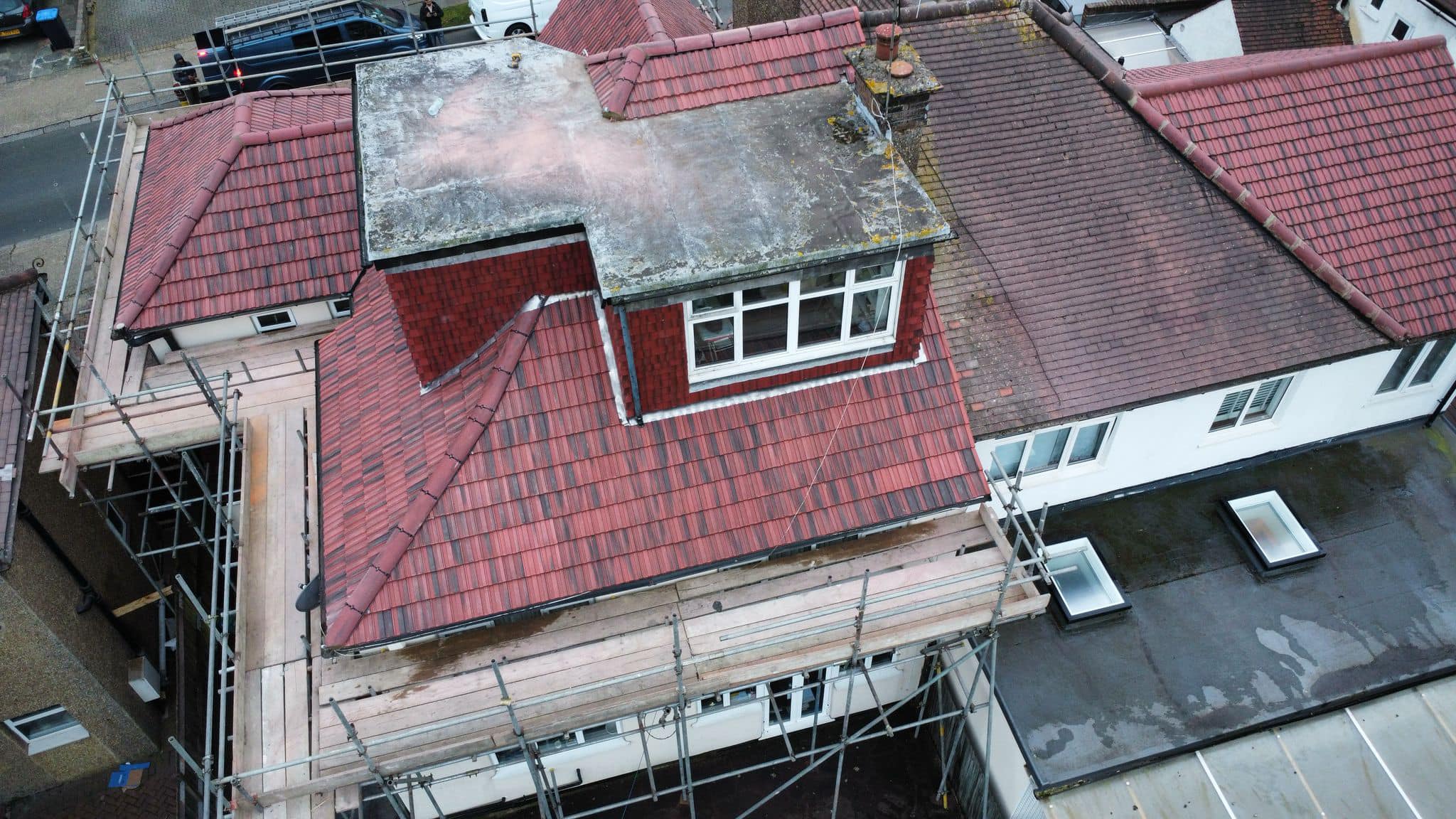 Professional roofers working on a property in London - KS Roof Master