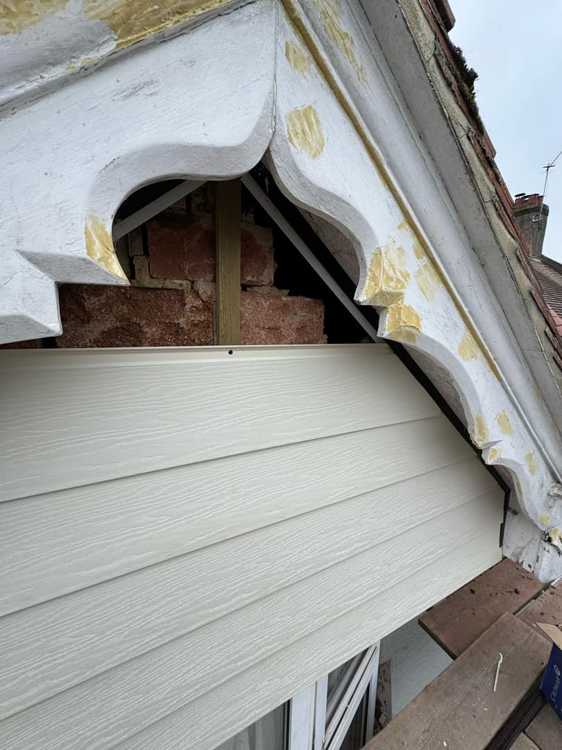 Professional roofers working on a property in London - KS Roof Master