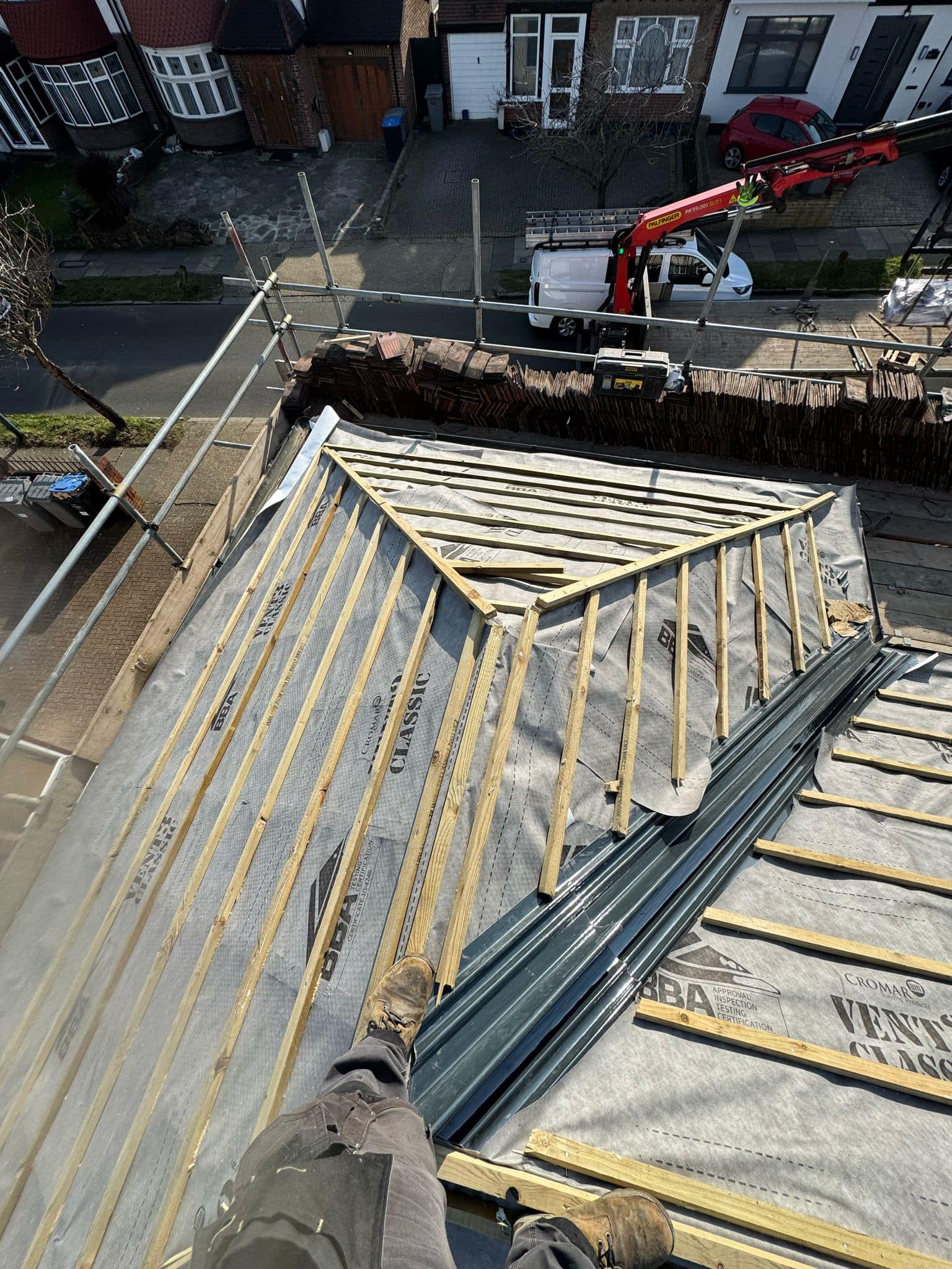 Professional roofers working on a property in London - KS Roof Master
