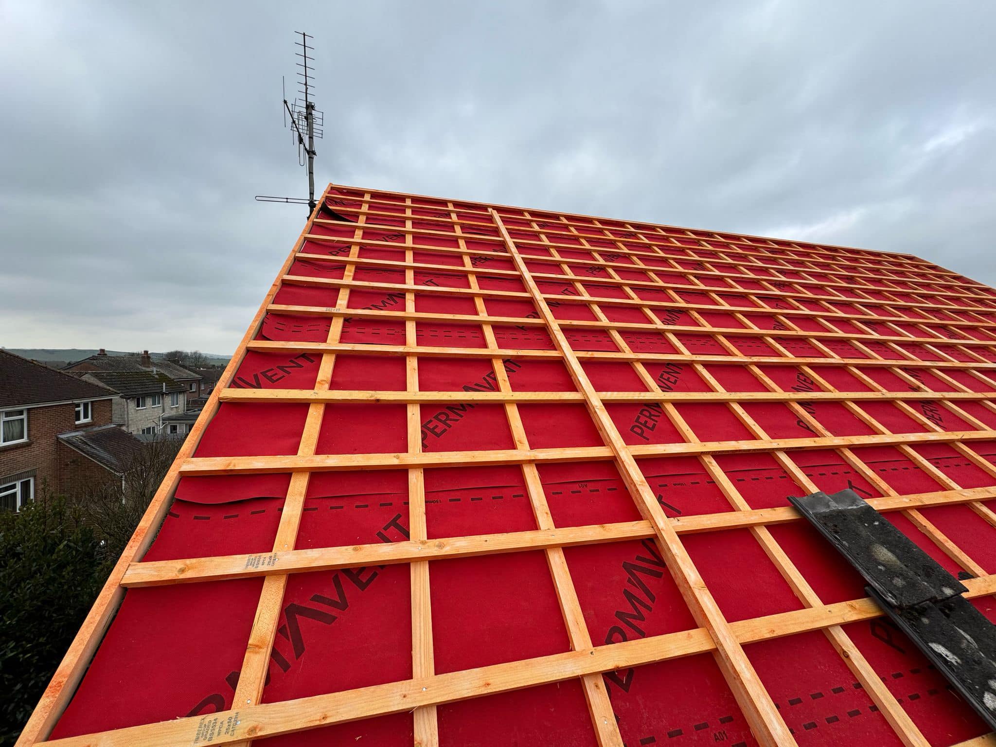 Professional roofers working on a property in London - KS Roof Master