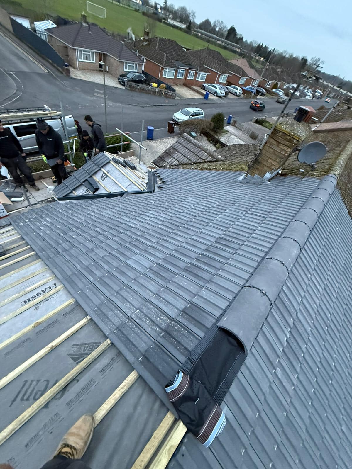 Professional roofers working on a property in London - KS Roof Master