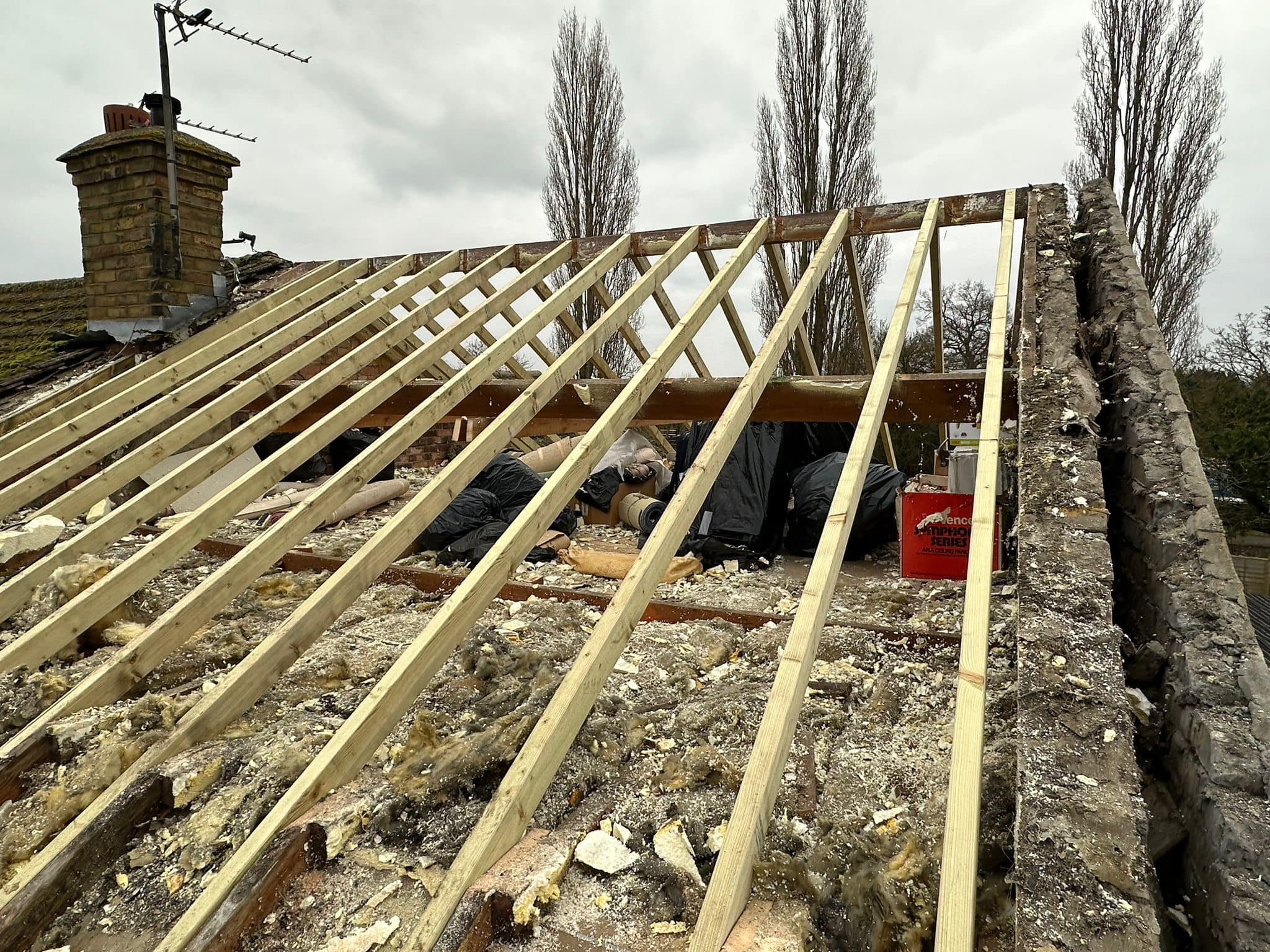 Professional roofers working on a property in London - KS Roof Master
