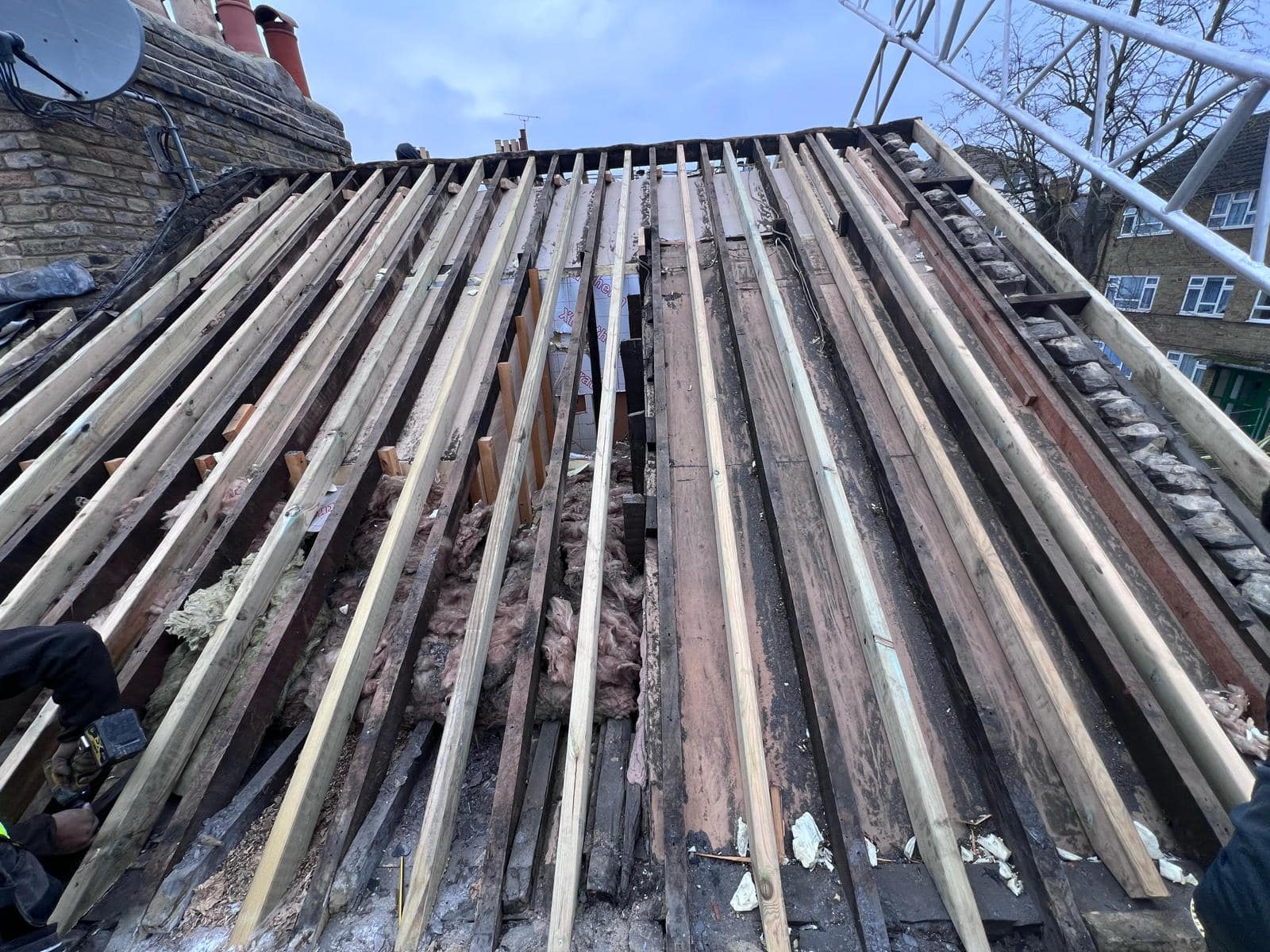 Professional roofers working on a property in London - KS Roof Master