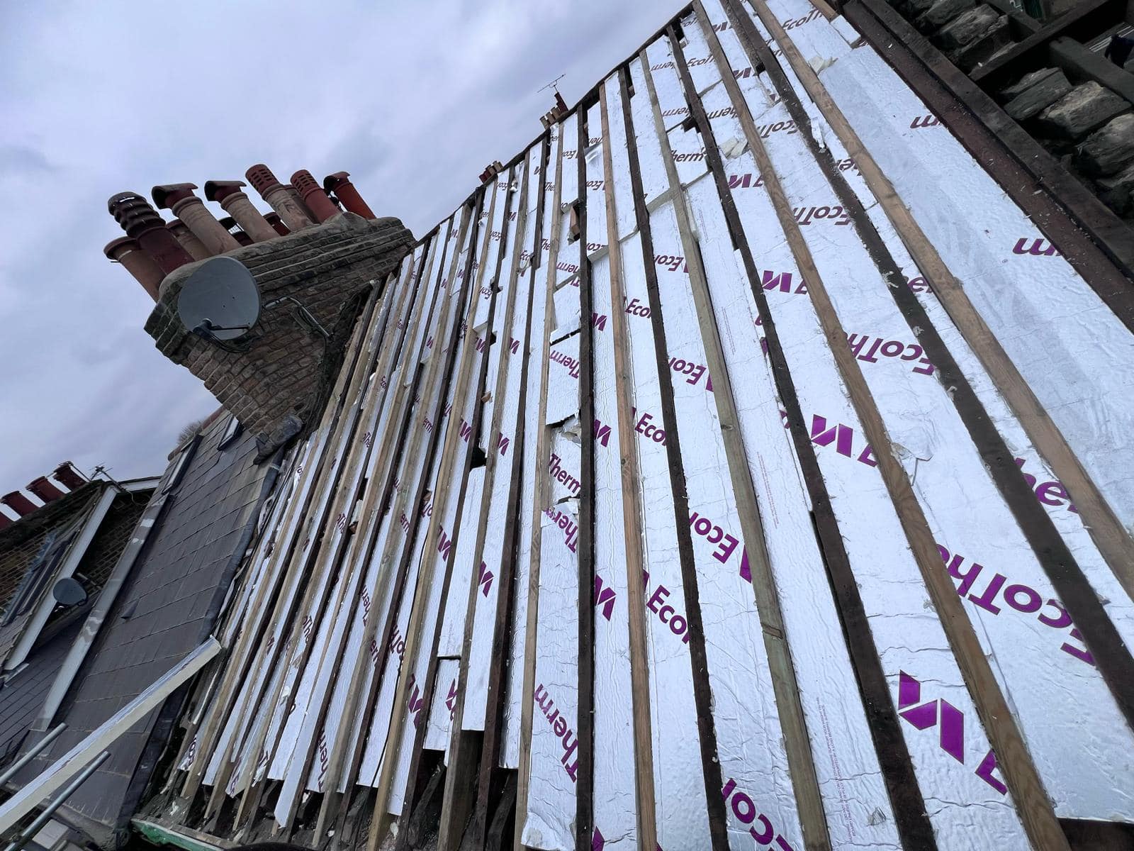 Professional roofers working on a property in London - KS Roof Master