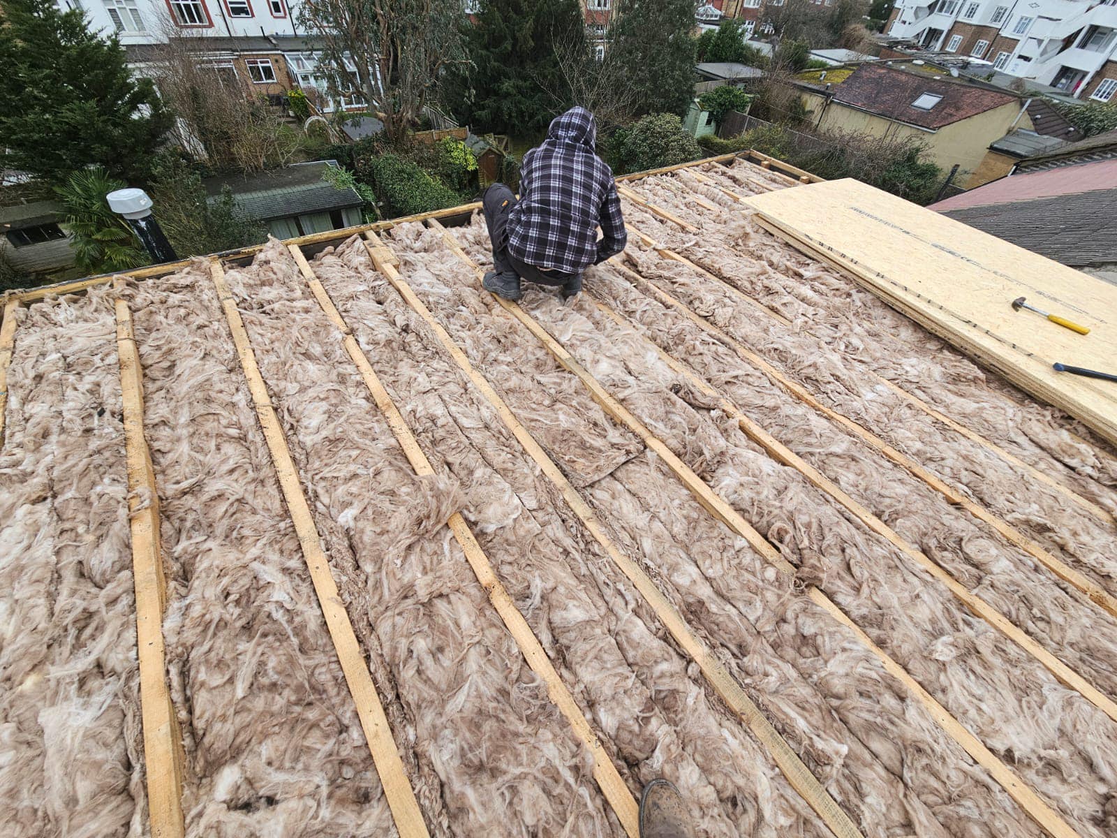 Professional roofers working on a property in London - KS Roof Master
