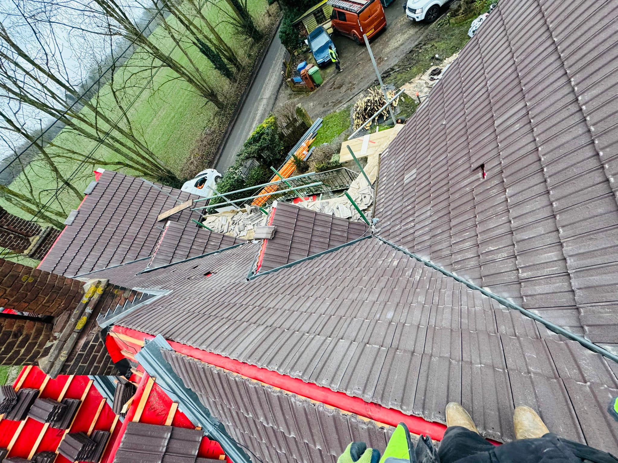 Professional roofers working on a property in London - KS Roof Master