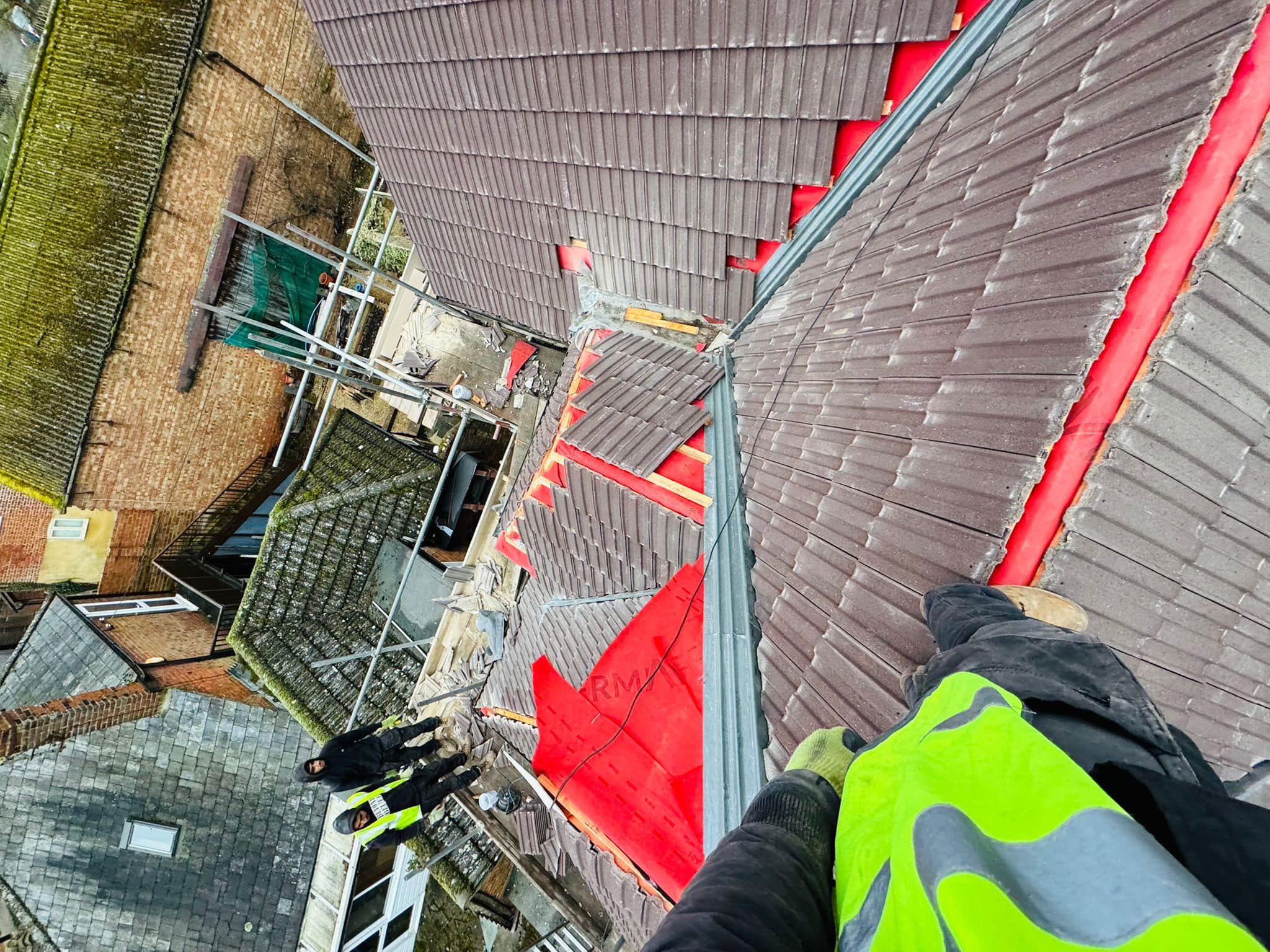 Professional roofers working on a property in London - KS Roof Master