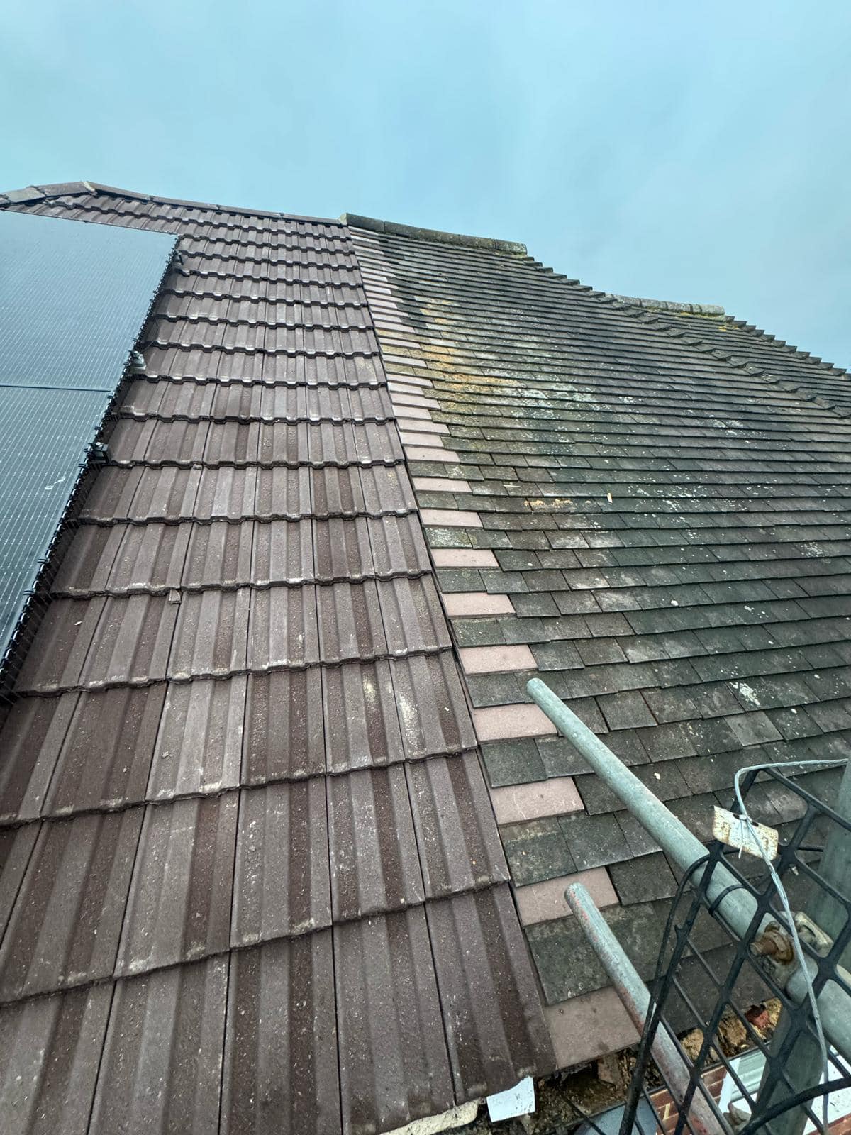 Professional roofers working on a property in London - KS Roof Master