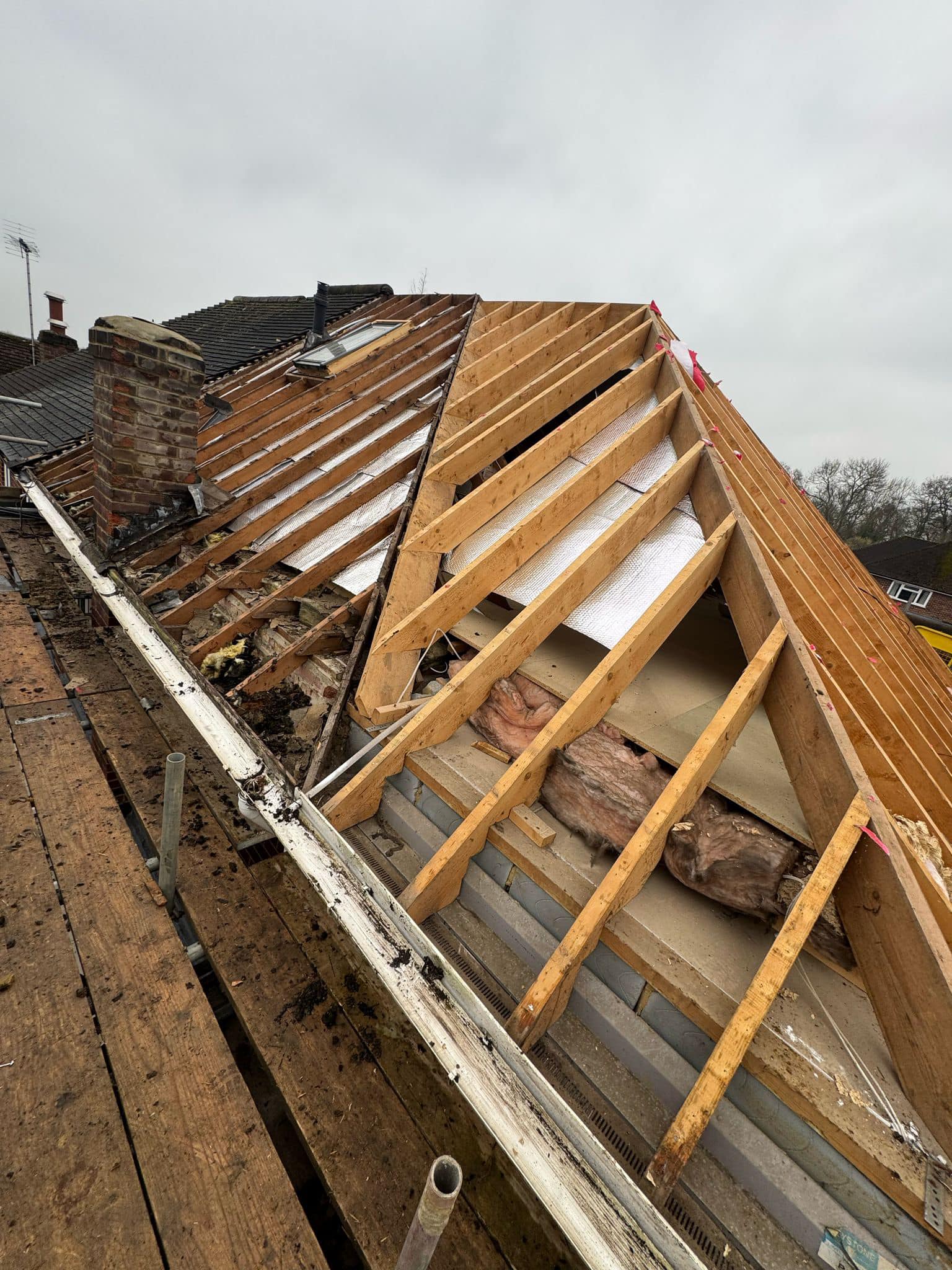 Professional roofers working on a property in London - KS Roof Master