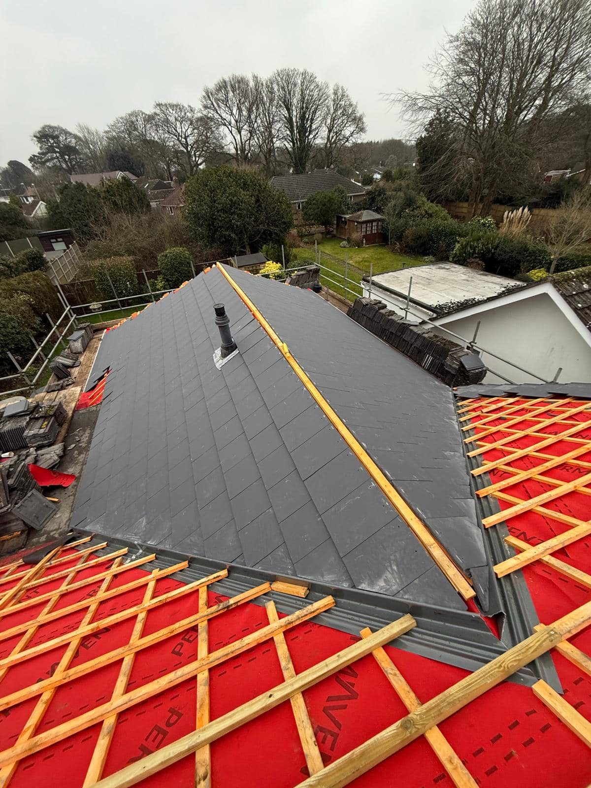 Professional roofers working on a property in London - KS Roof Master